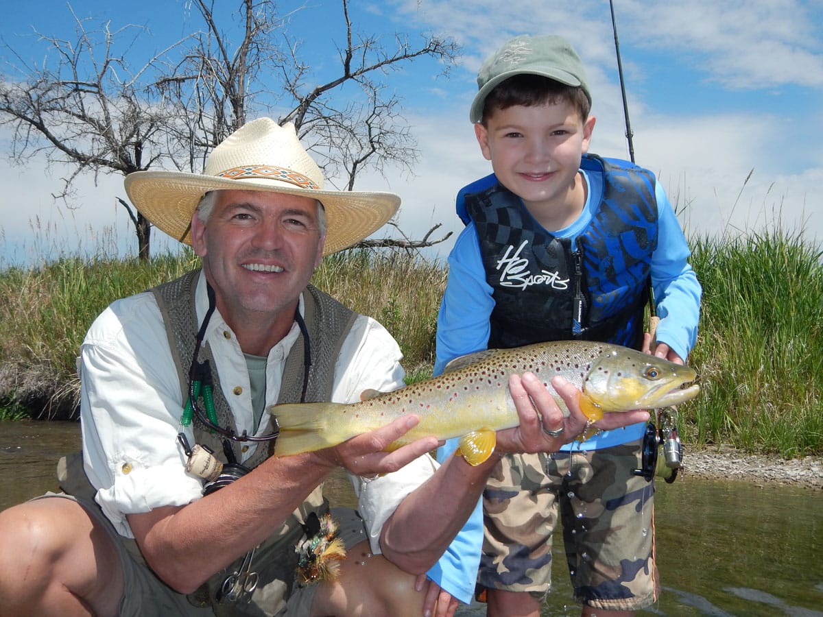 greg and son with fish on ruby river