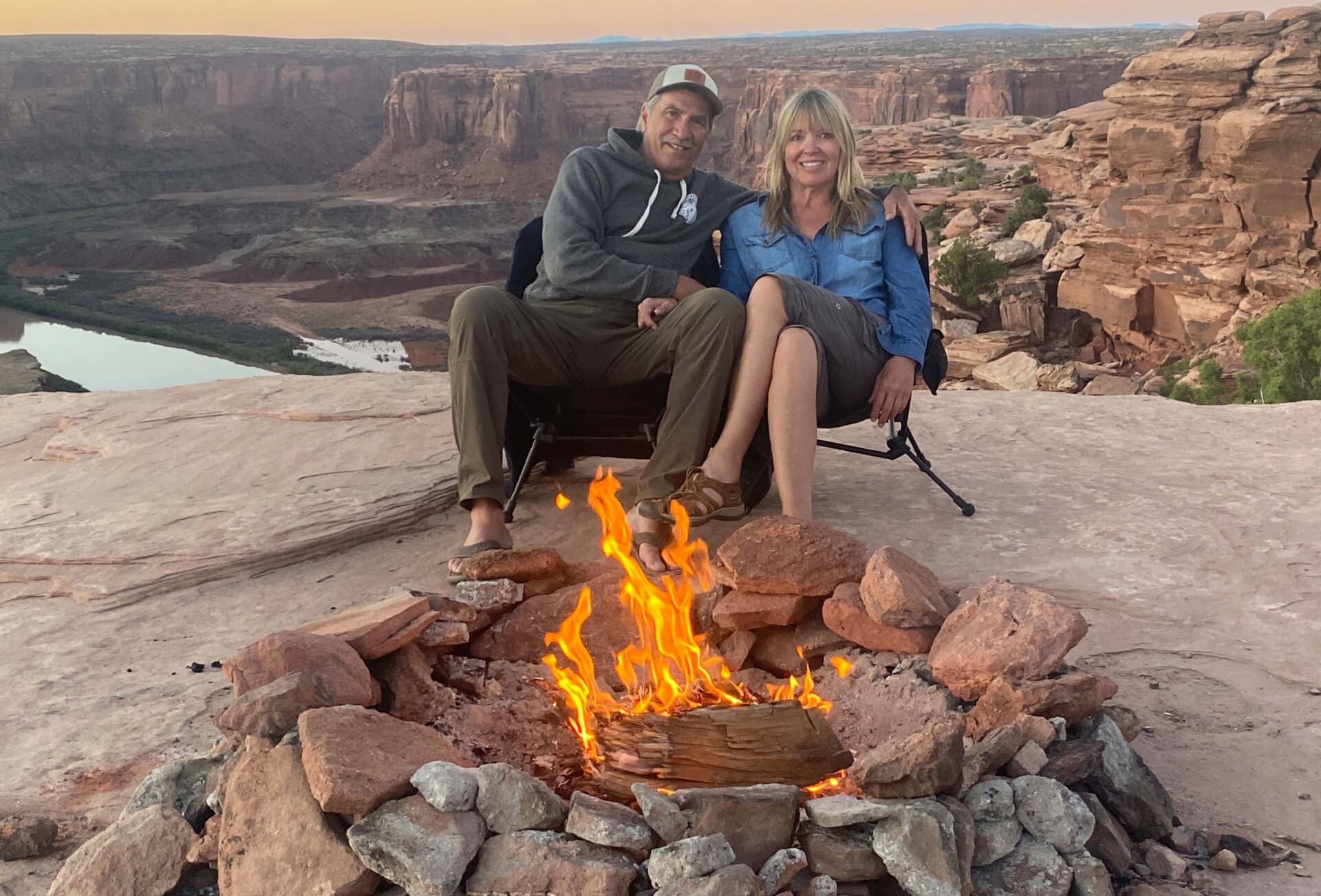 jim vidamour co nm ut agent by bonfire with wife