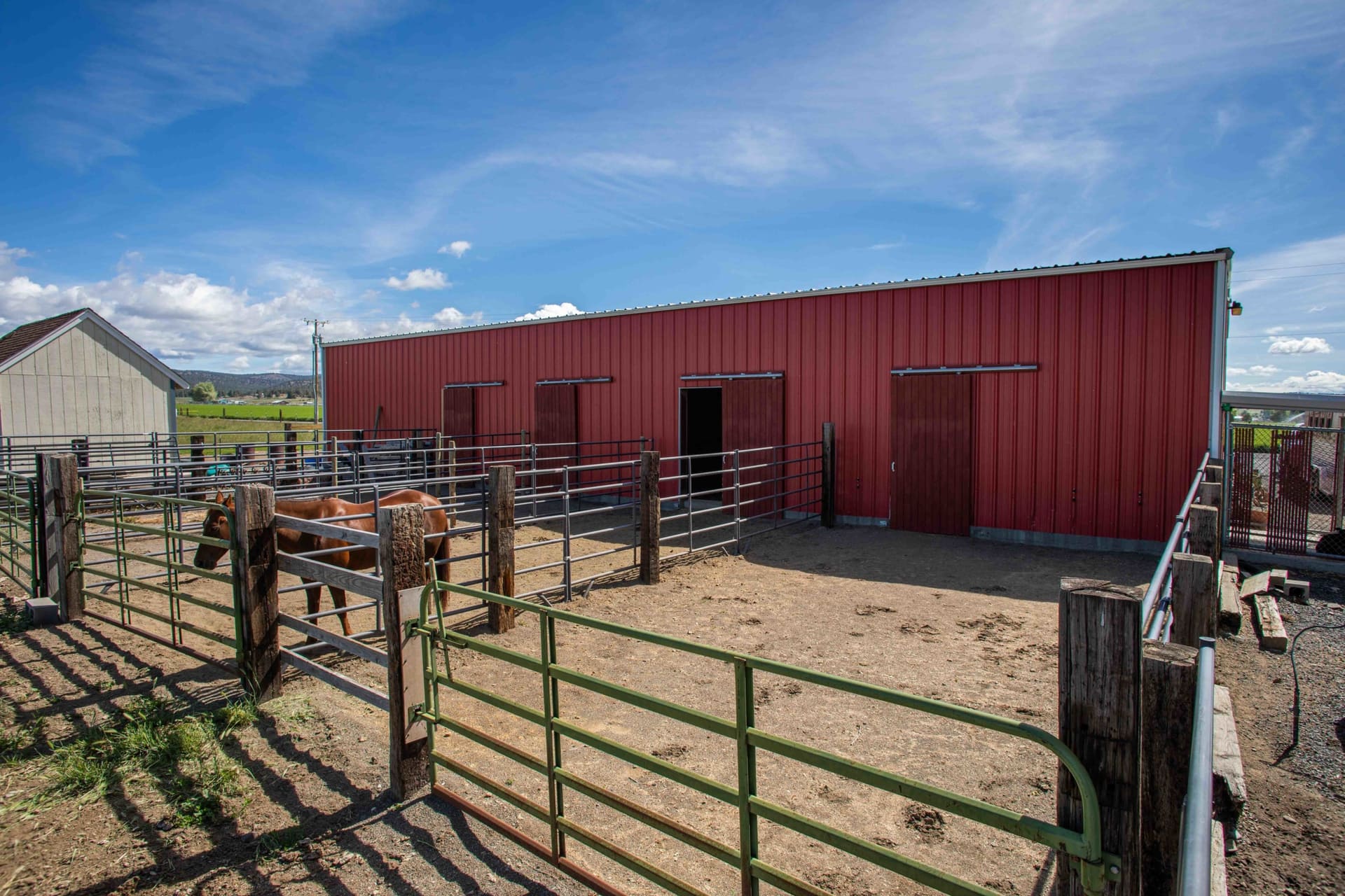 barn-with-horse-runs-hay-storage-tack-room-equestrian-ranch
