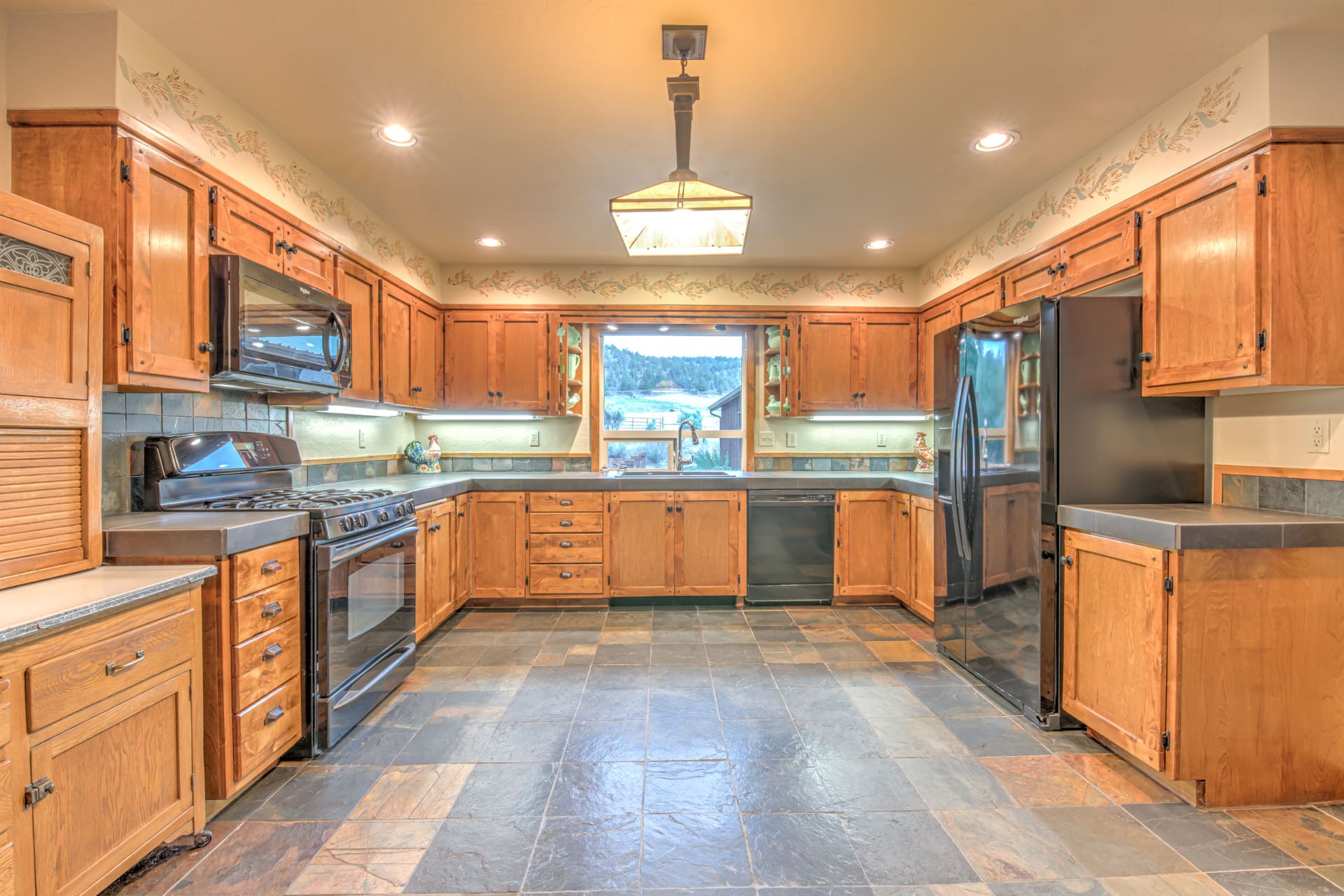 large kitchen with custom cabinets oregon western living