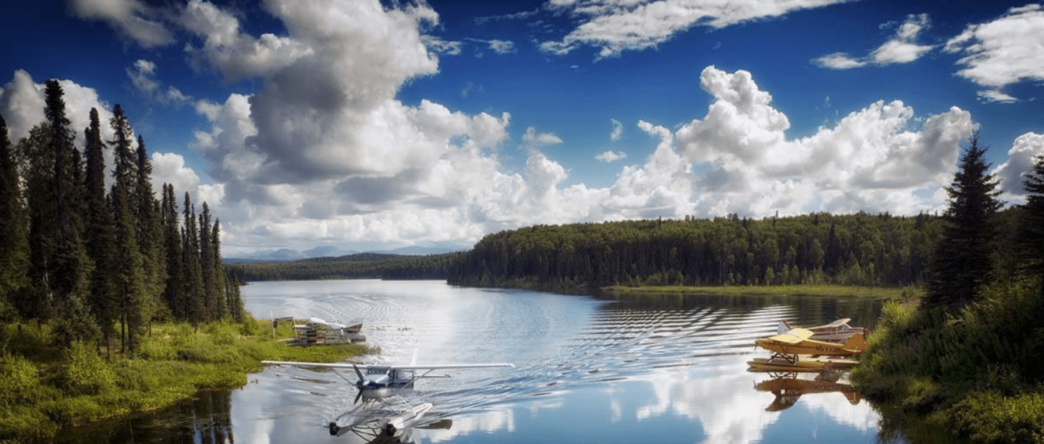 Floatplanes on the river alaska gold creek lodge