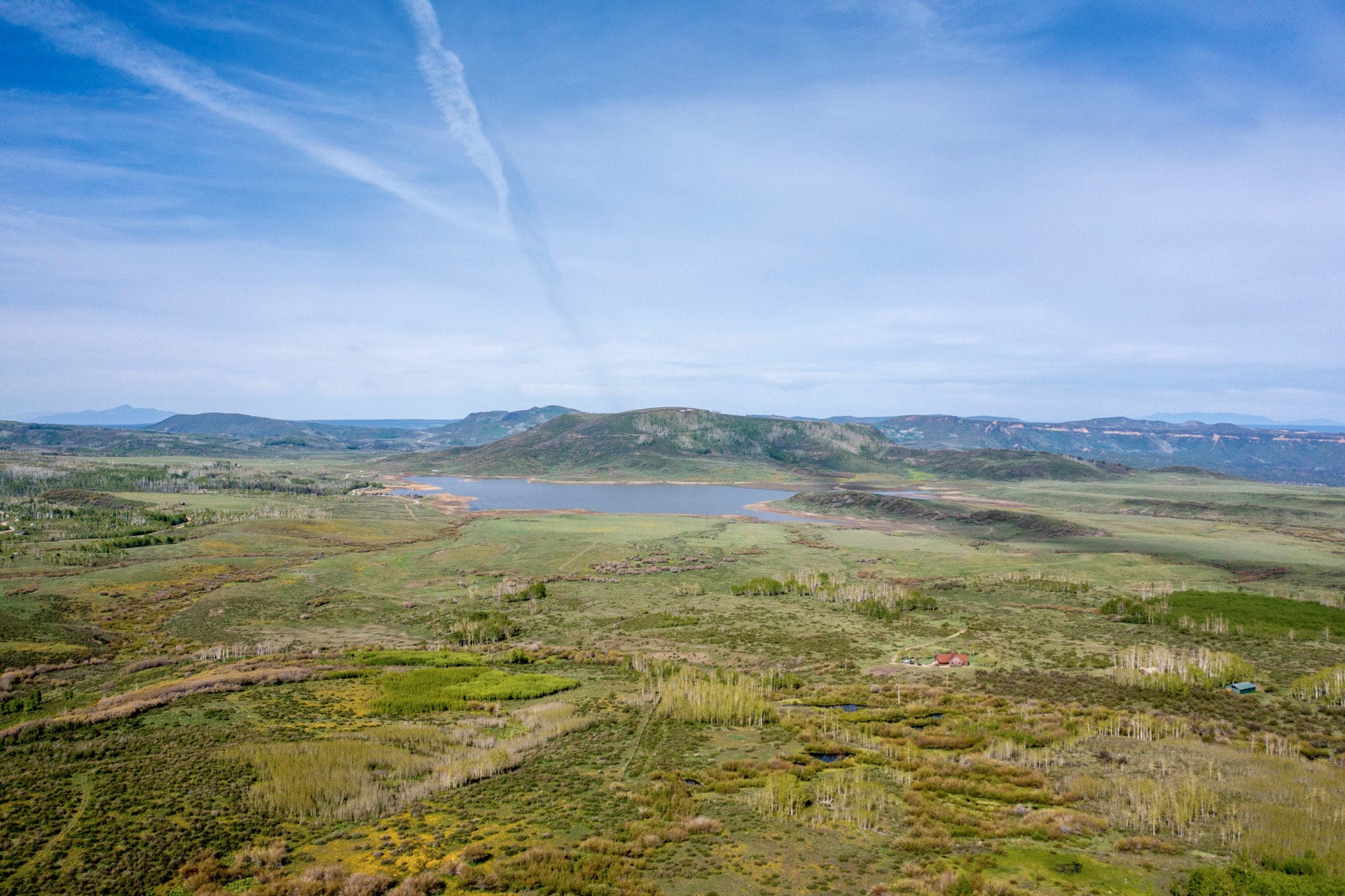 Long view of Groundhog reservoir Colorado Brumley Aspen Waters Ranch