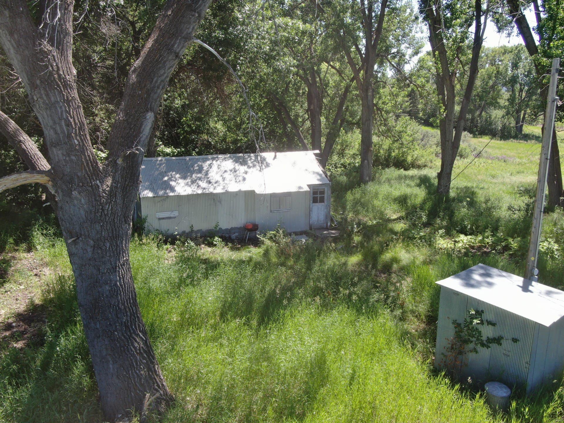 shack outhouse montana riverbend angler cabins