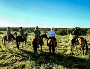 cowboys horseback new mexico chupadera ranch