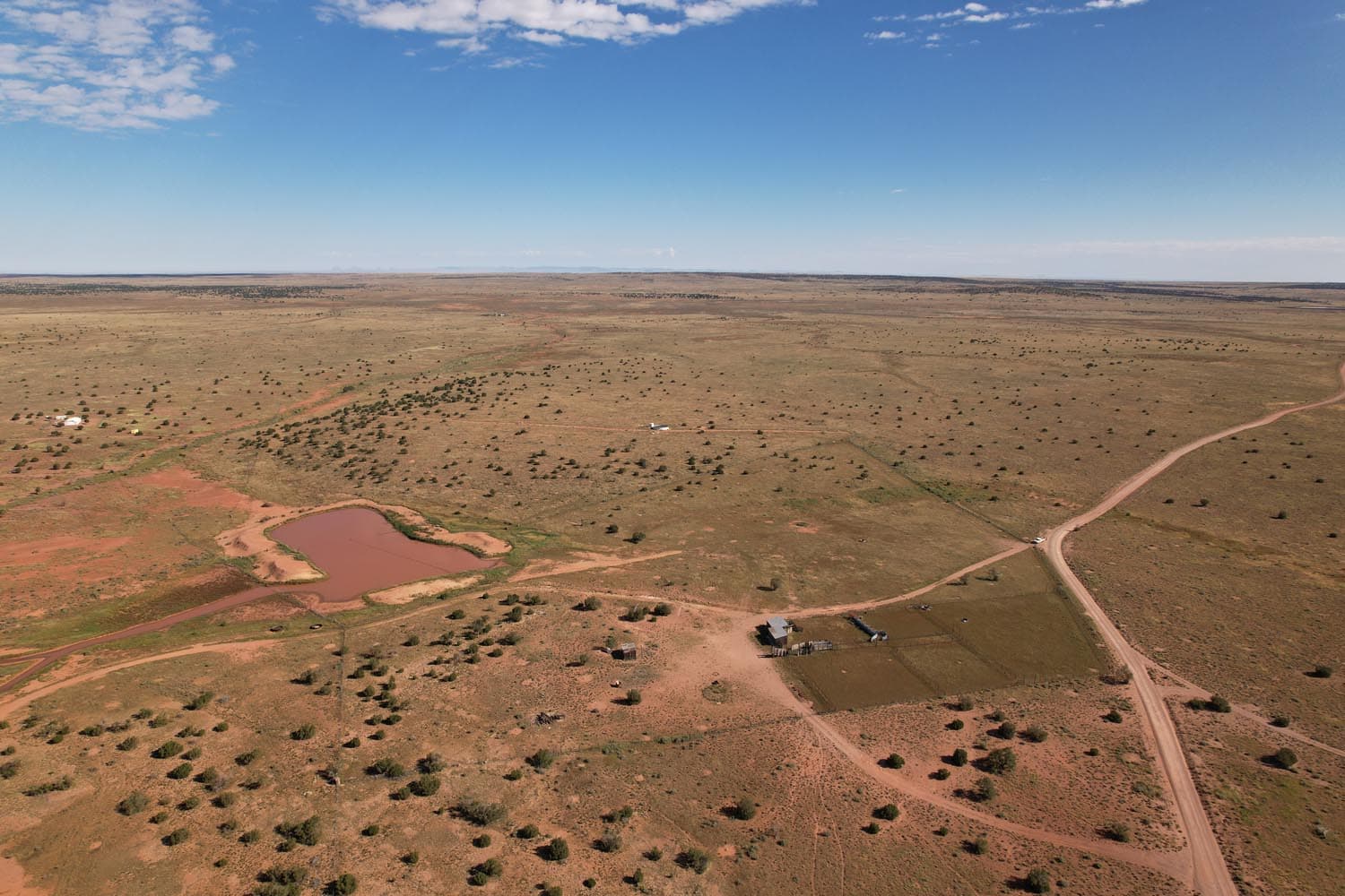dirt tank pens water storage arizona ox yoke ranch