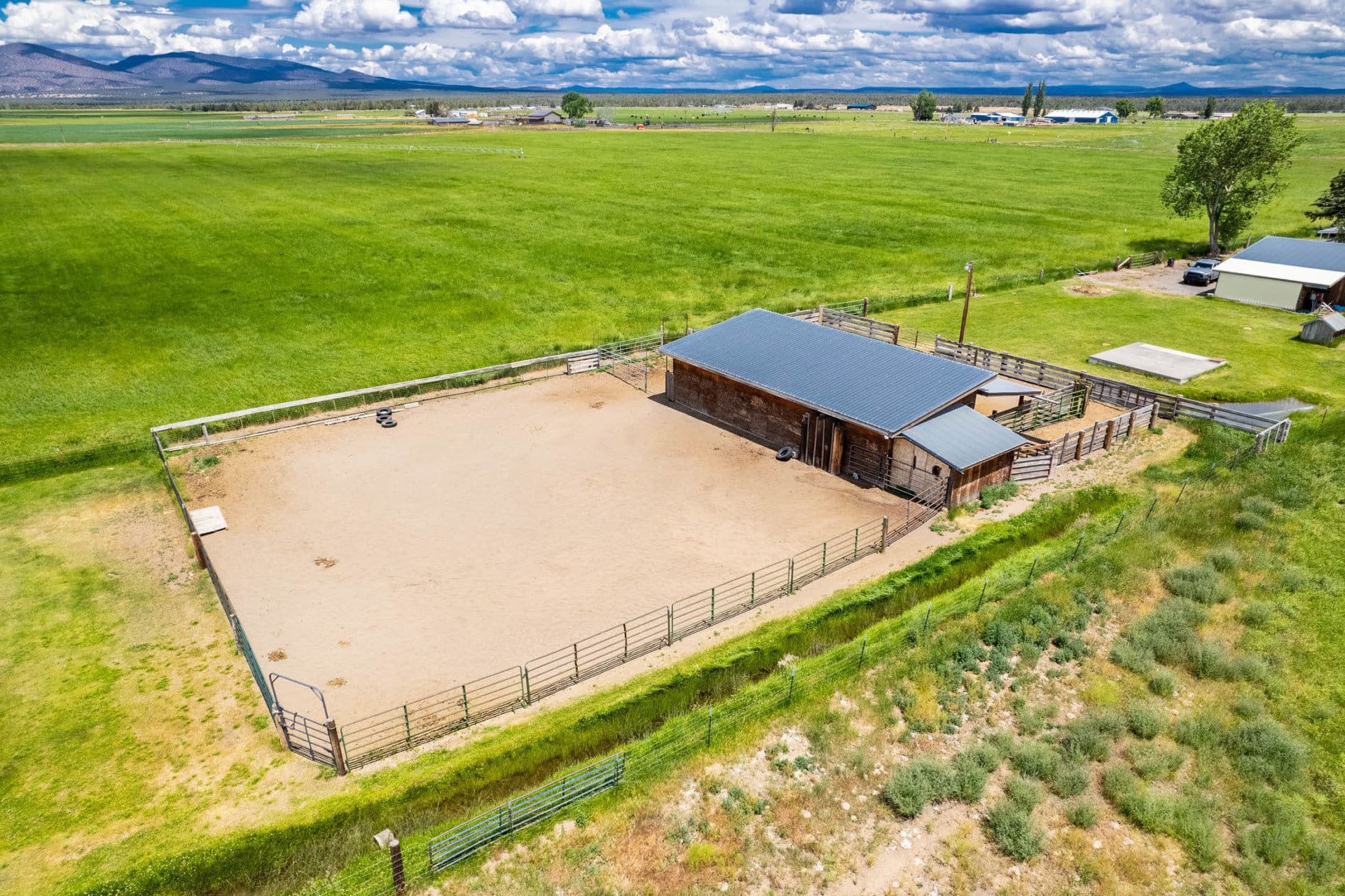 aerial horse barn oregon green grass farm