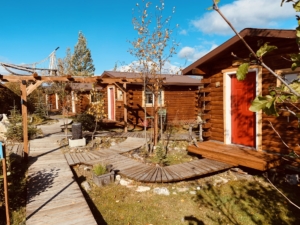 front row of cabins with walkway alaska earthsong lodge