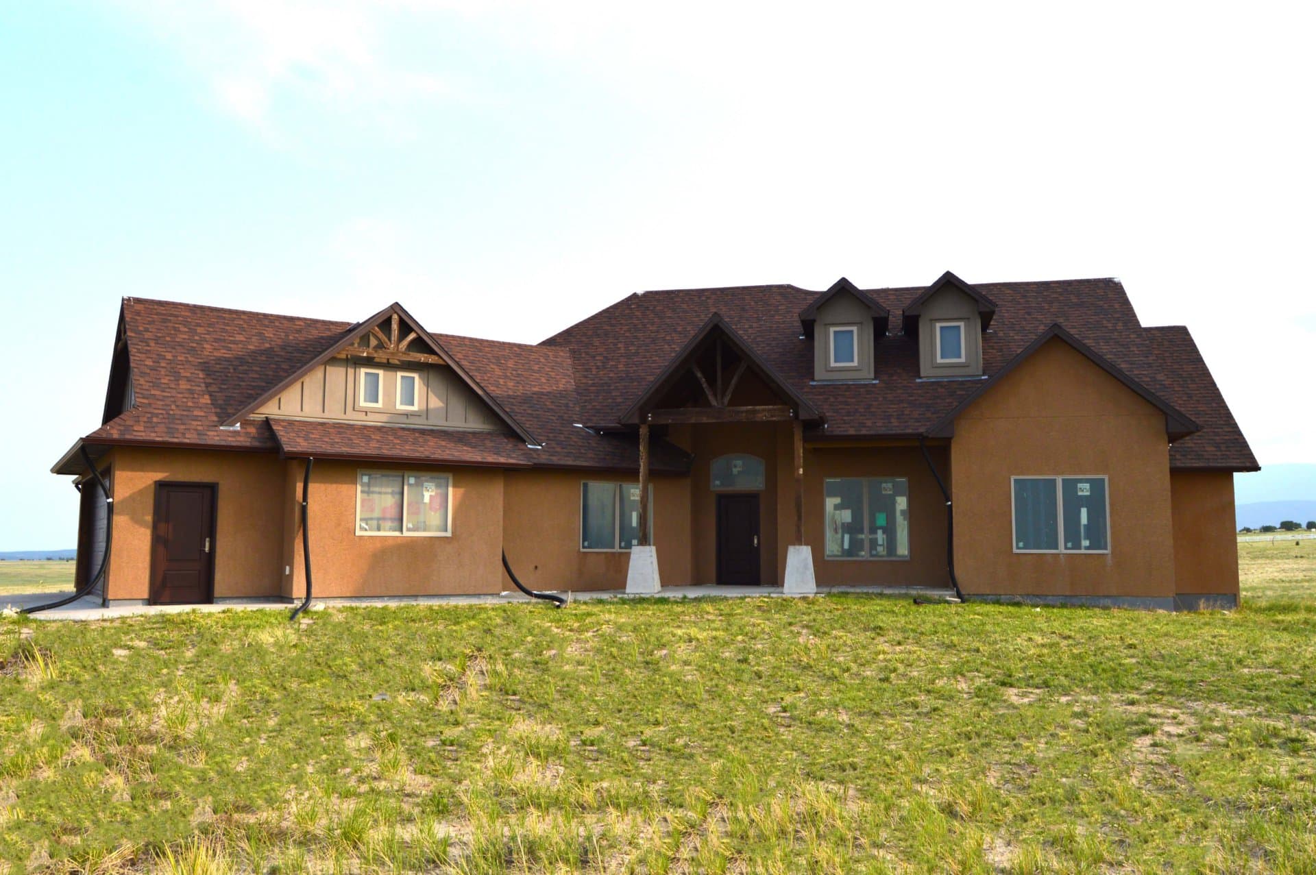 post and beam front of house colorado painted sky ranch