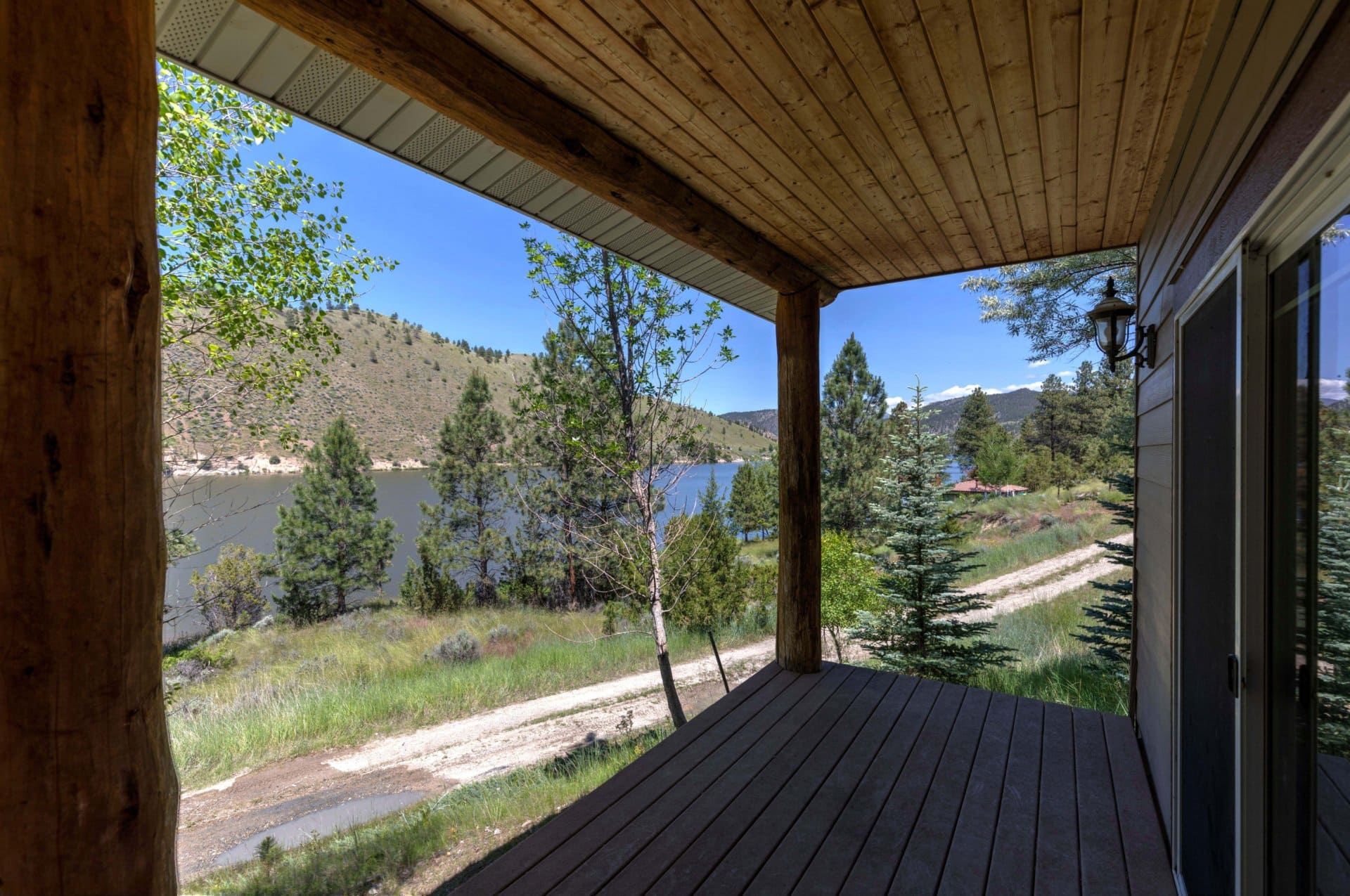 Front Porch Views To Black Sandy Montana Waters Edge on Hauser Lake
