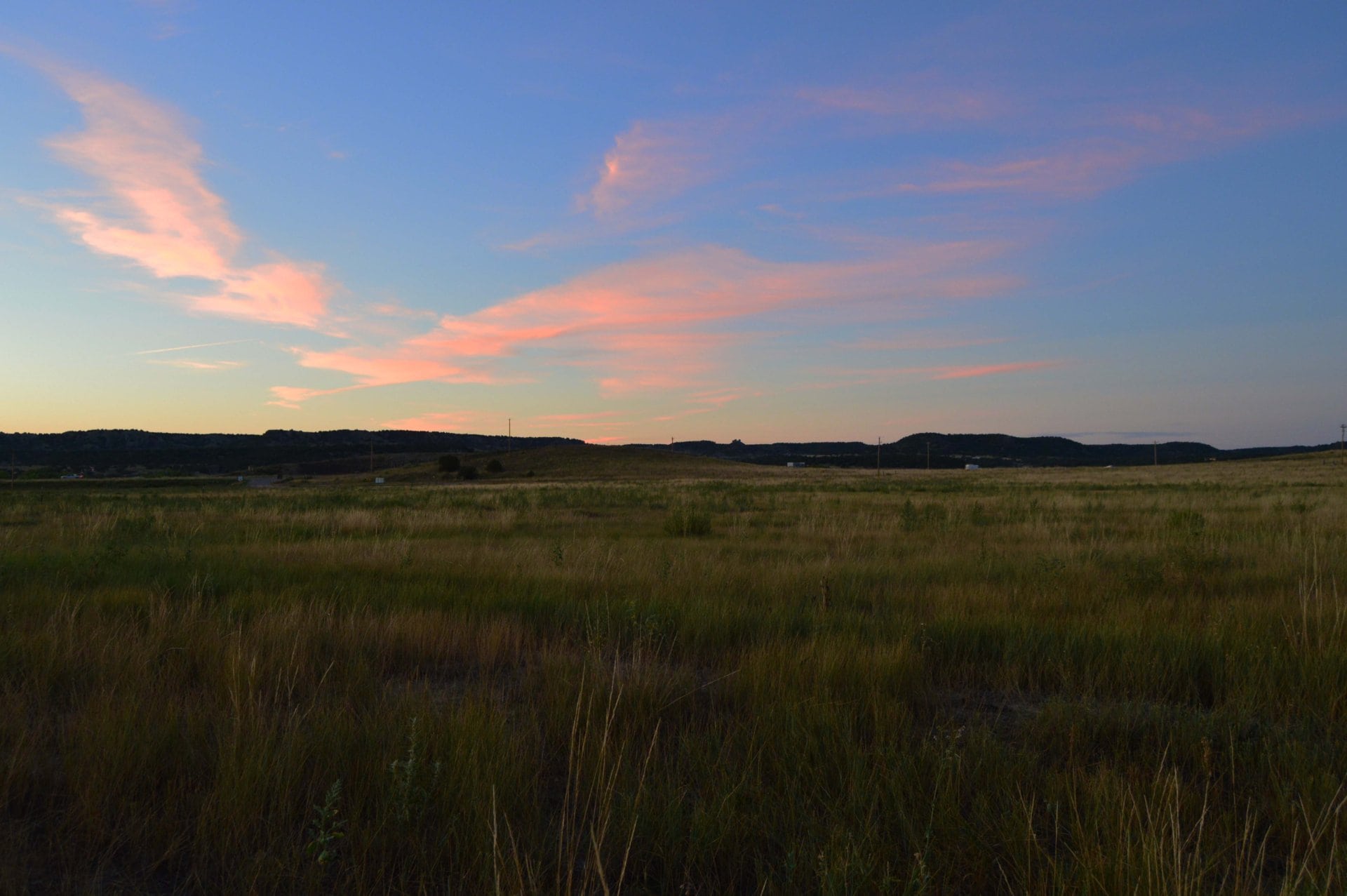 sunrise over grass covered pastures colorado zoes ranch