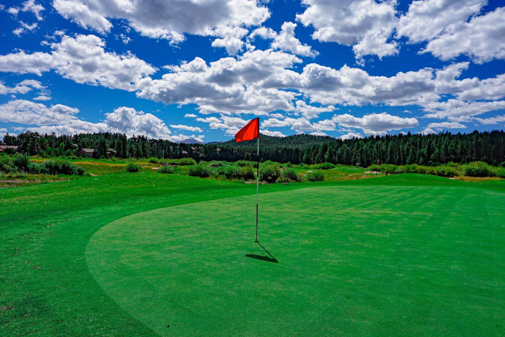pin green clouds colorado shining mountain golf course