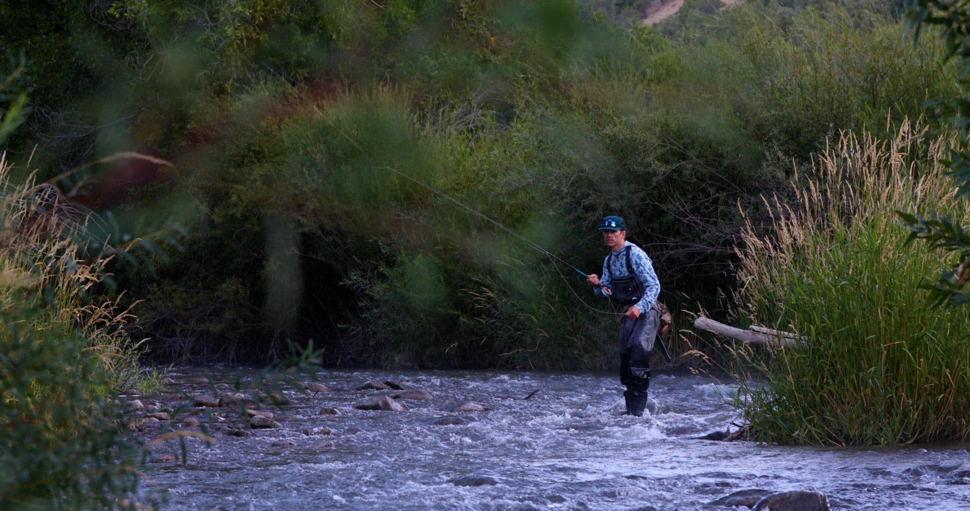 blue shirt fly fishing colorado sweetwater ranch