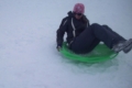 Naomi Alm licensed montana real estate broker sledding