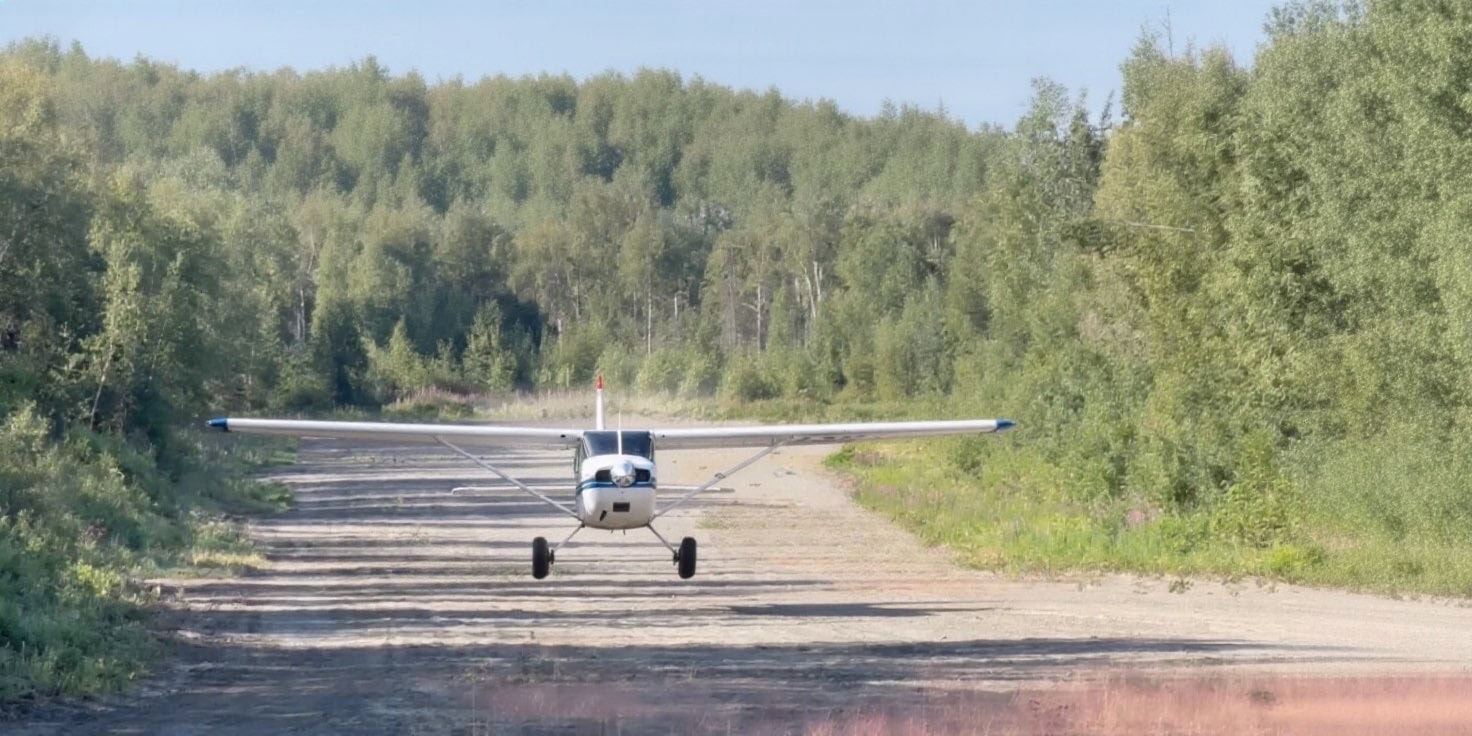 plane landing on air strip alaska shulin lake resort