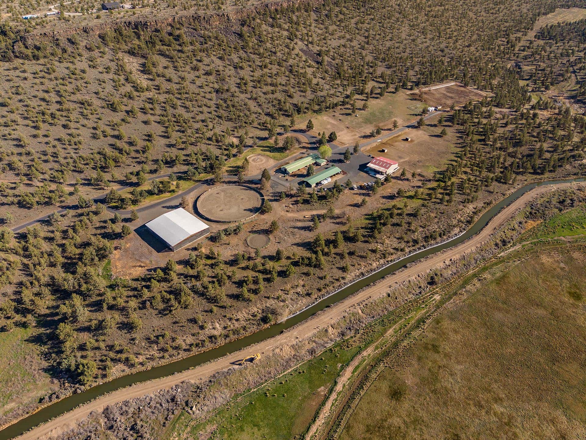 aerial view of ranch layout with arena barn and shop oregon crooked river rim horse ranch