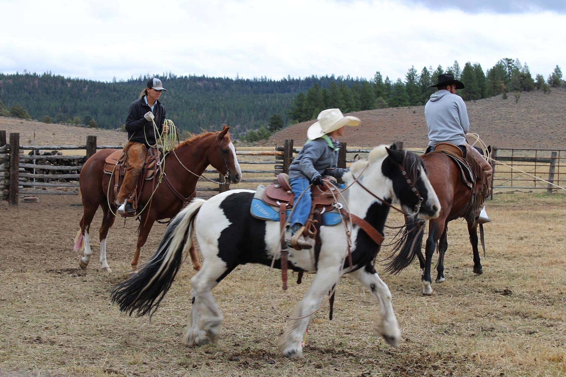 cowboys horseback ranch work cattle operation oregon aspen ridge ranch