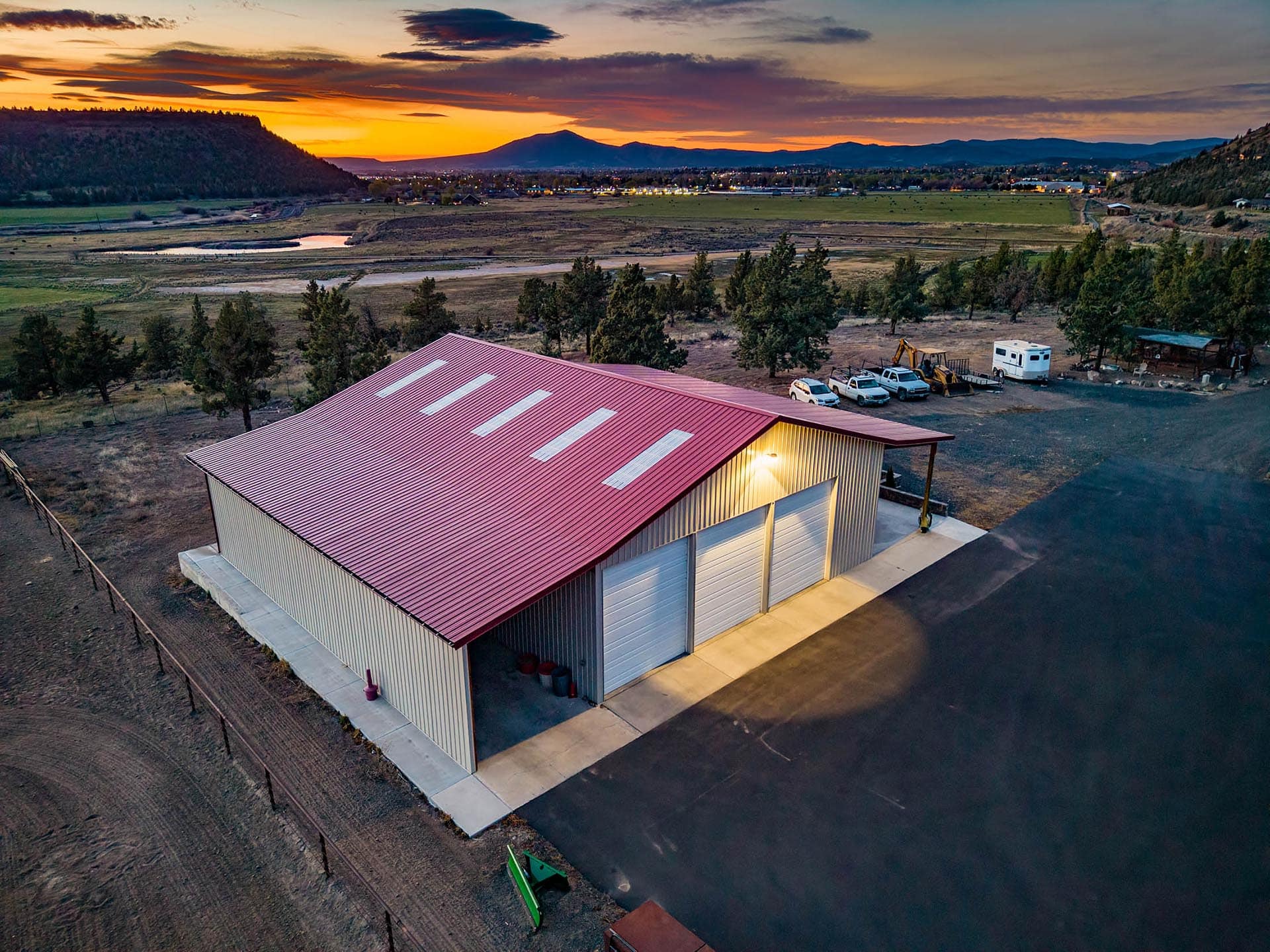 horse barn with stalls and paddocks at sunset oregon crooked river rim horse ranch
