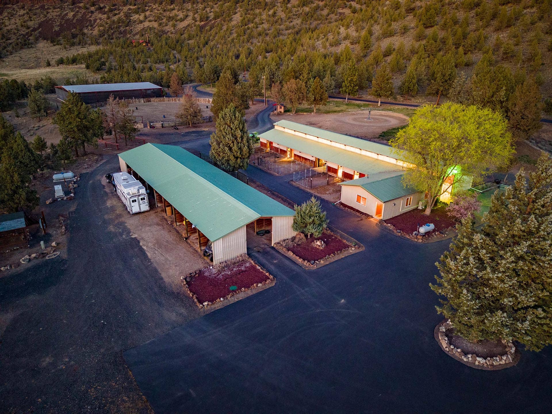 horse barn with stalls and paddocks at sunset oregon crooked river rim horse ranch