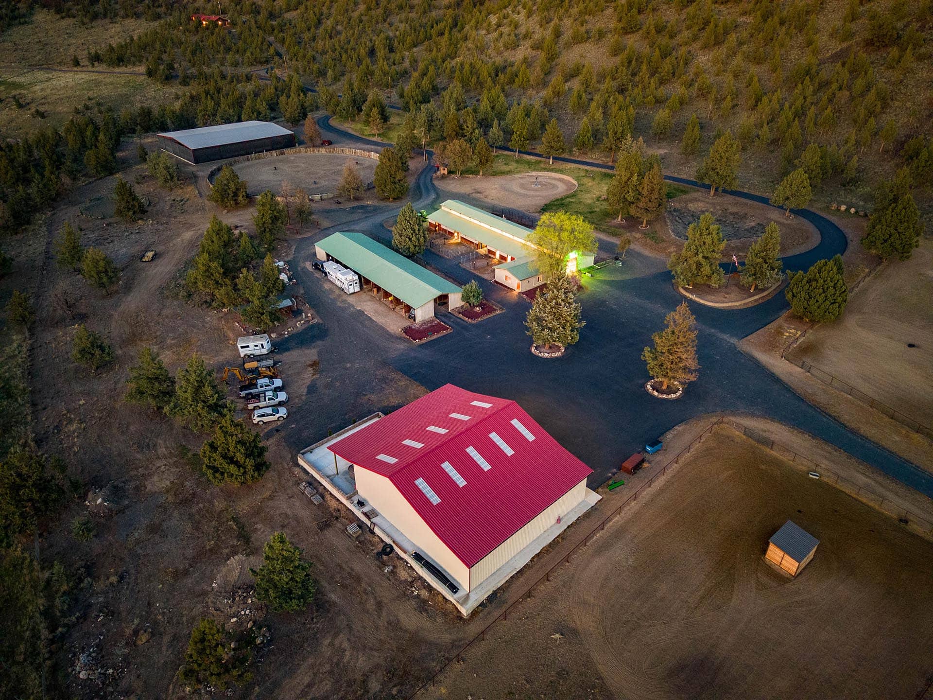horse barn with stalls and paddocks at sunset oregon crooked river rim horse ranch