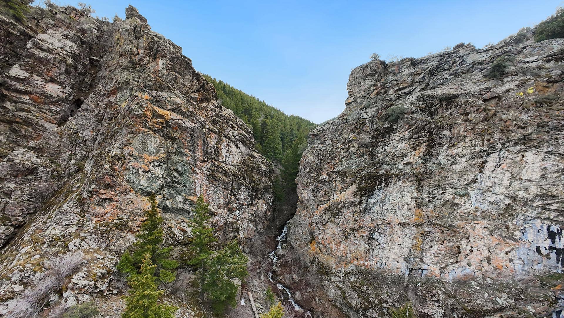 land with natural waterfall Idaho the davis lodge at loafer creek falls