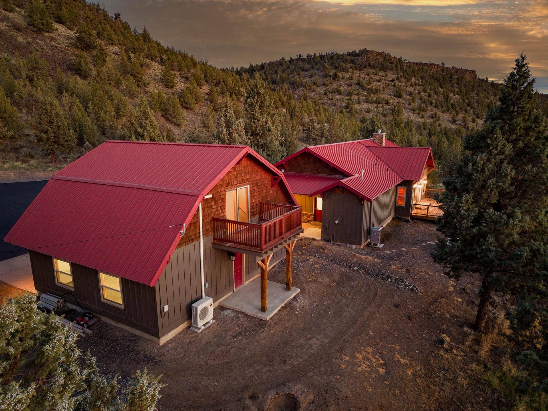 luxury ranch home exterior with covered porch at sunset oregon crooked river rim horse ranch