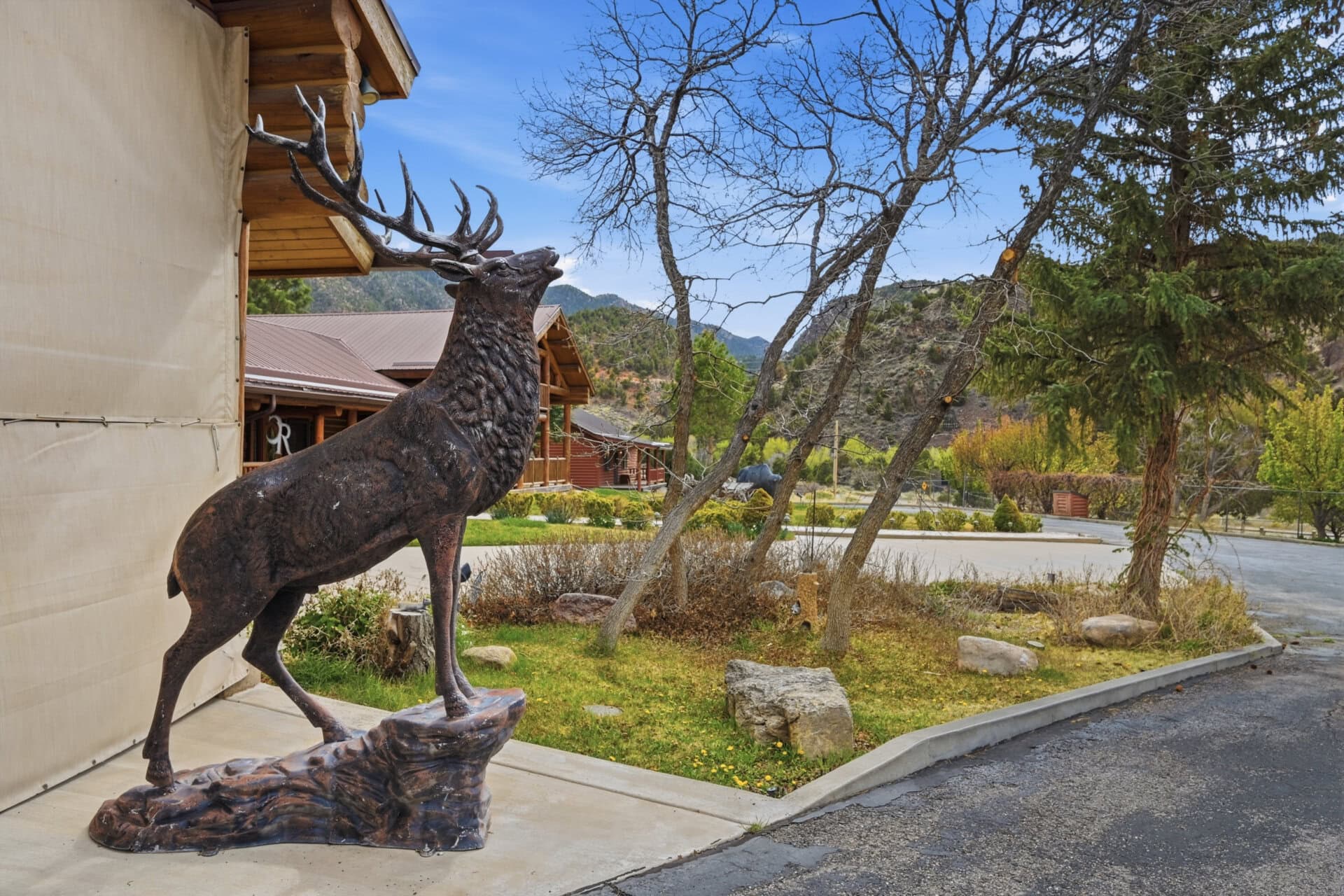property with mountain views and elk statue utah casa del rio