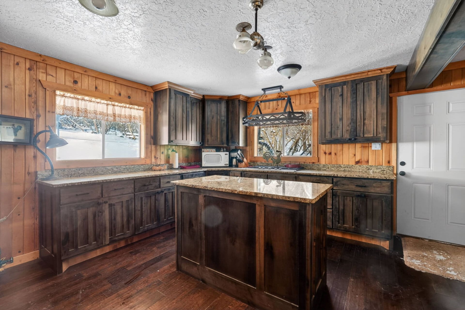 rustic kitchen with island view Idaho the davis lodge at loafer creek falls
