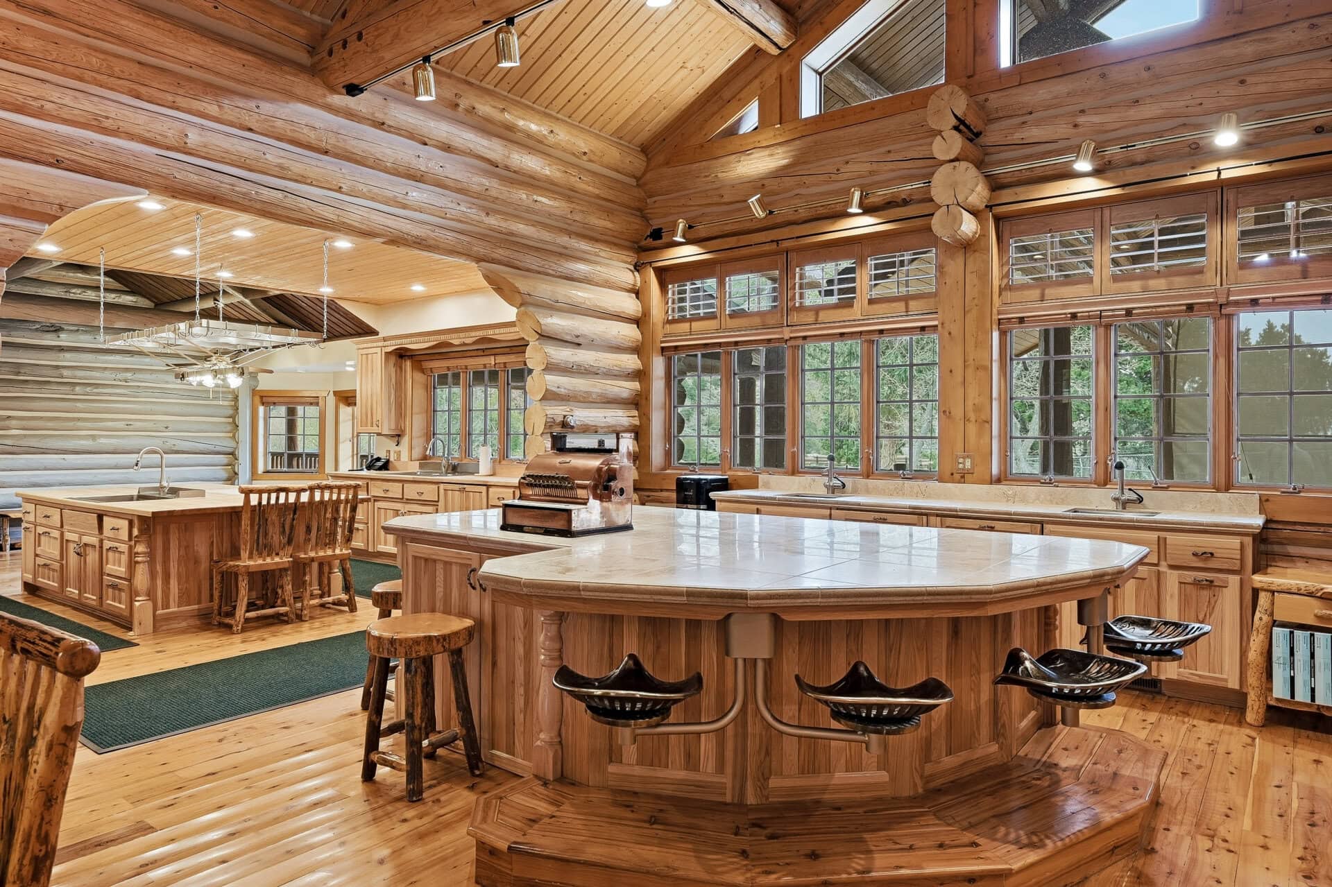 spacious log home kitchen with exposed log beams utah casa del rio