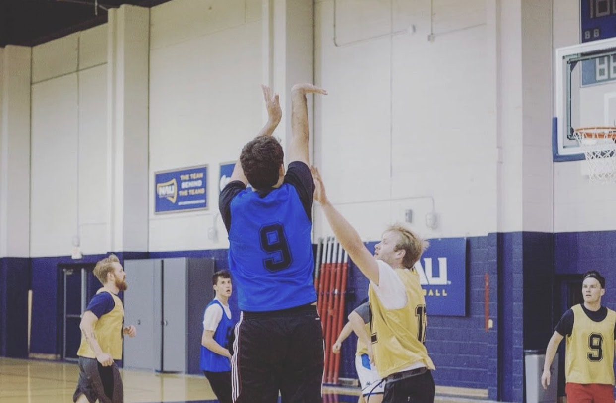 thomas sarlo graphic designer playing basketball