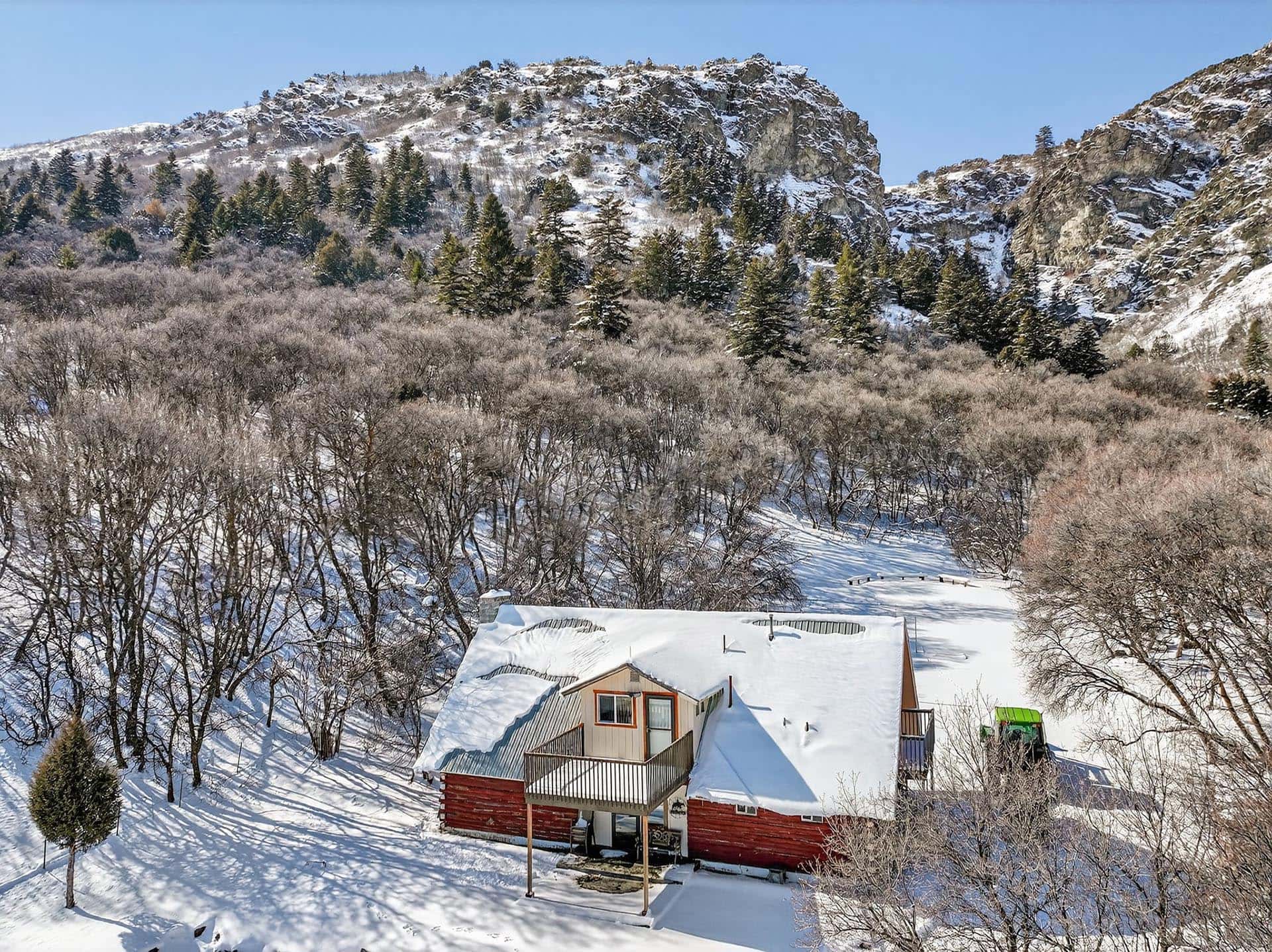 winter lodge with mountain backdrop Idaho the davis lodge at loafer creek falls