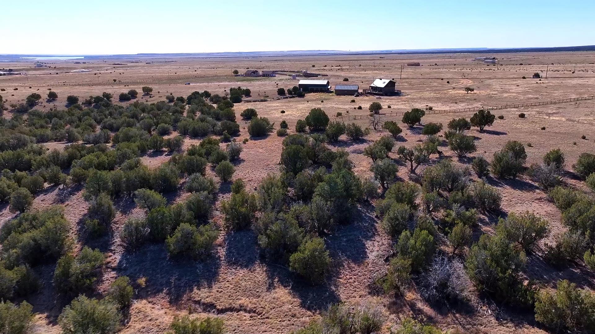 aerial view of pinyon juniper land with outbuildings colorado mchenry ranch