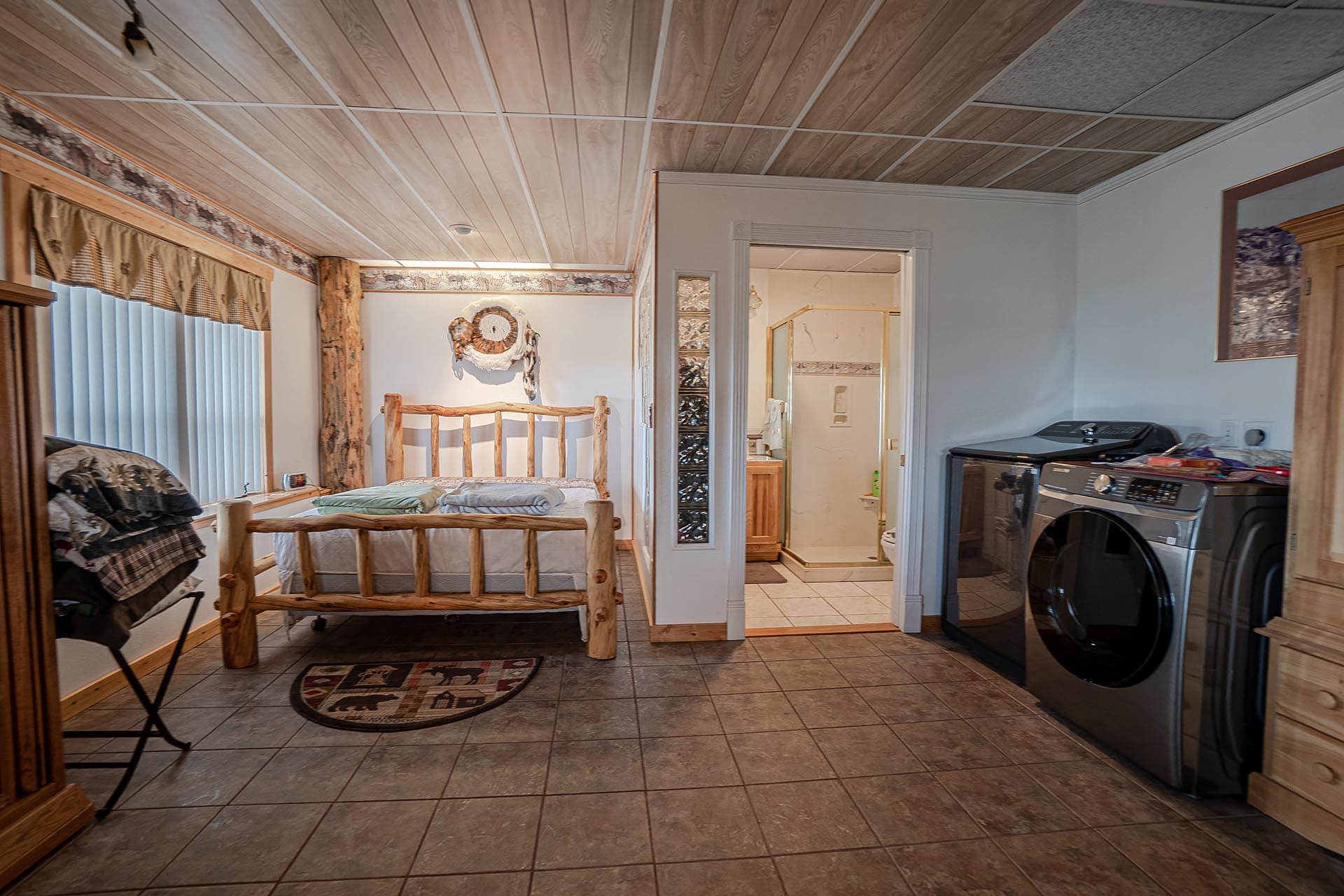bedroom with laundry area colorado bar d ranch