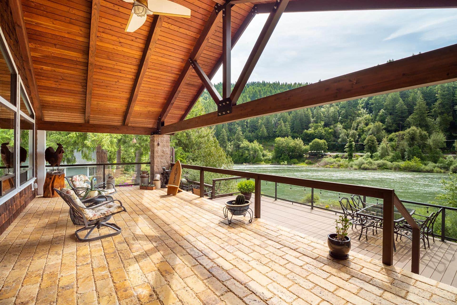 covered patio overlooking river oregon umpqua river retreat at cougar creek