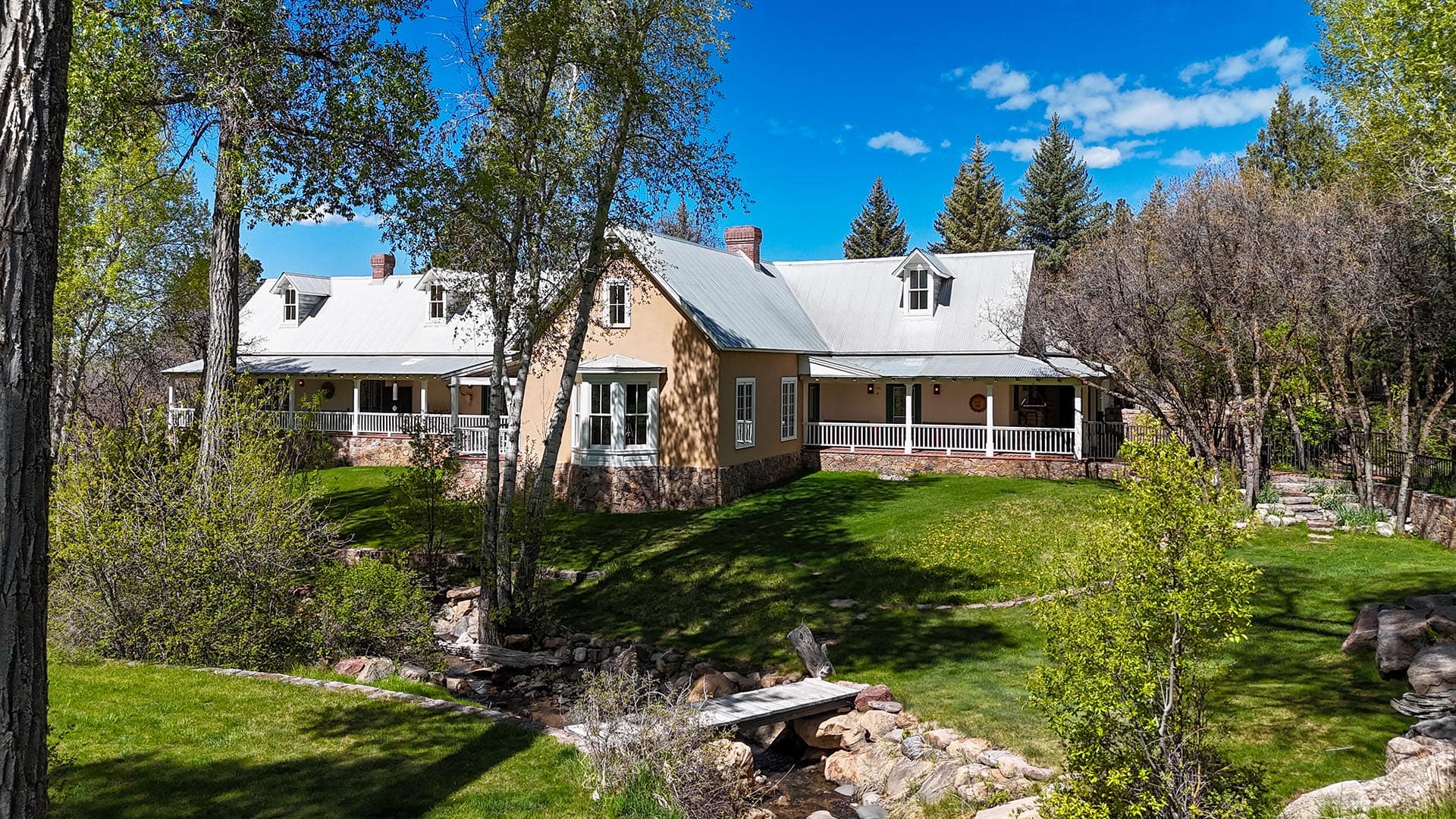 land for sale with stucco home and stream new mexico old canones creek ranch