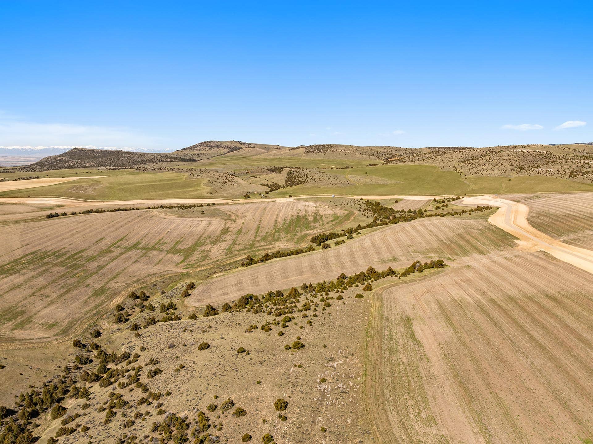 large acreage with tilled fields and rolling hills montana skinner road sanctuary at sxs ranch