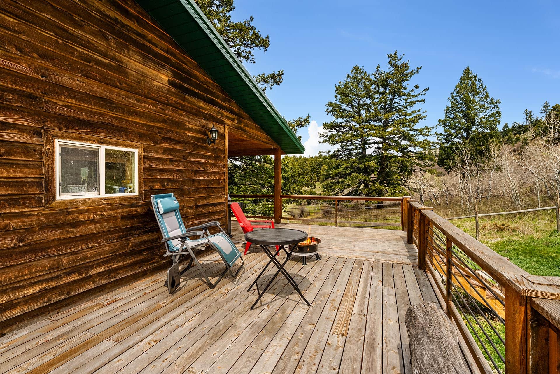 log cabin exterior with deck land montana harrison hollow