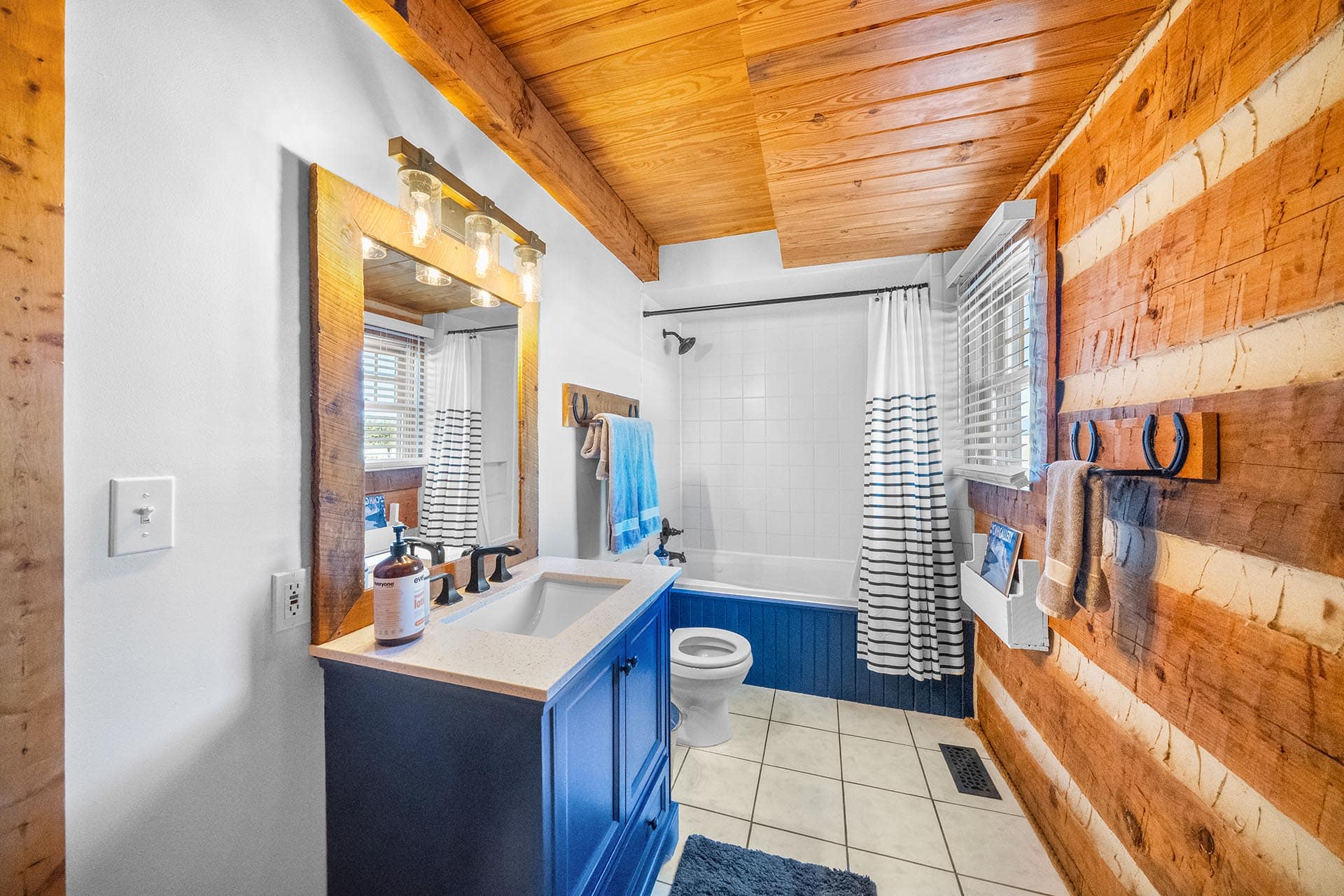 log home bathroom with tub shower colorado mchenry ranch