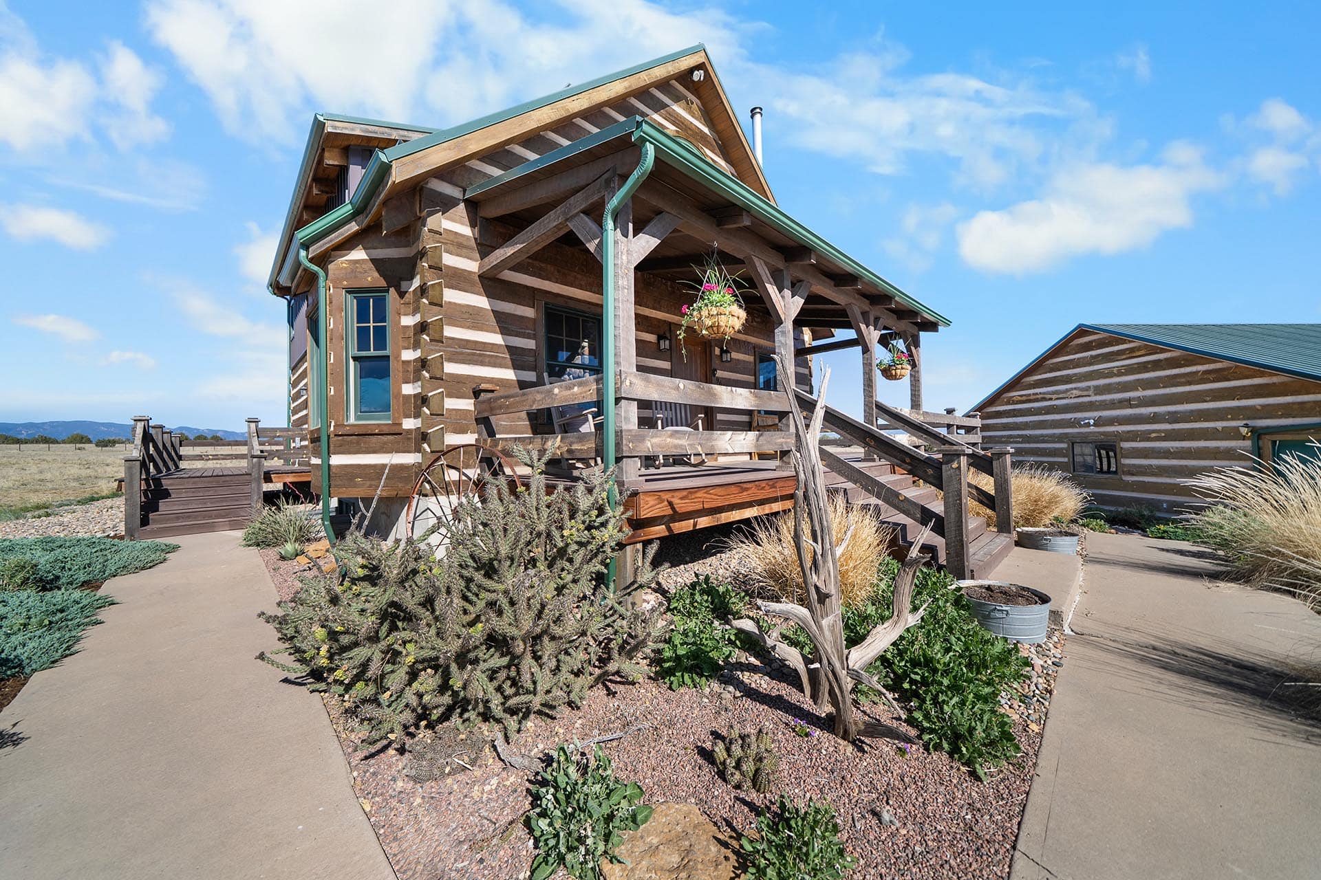 log home with desert landscaping colorado mchenry ranch