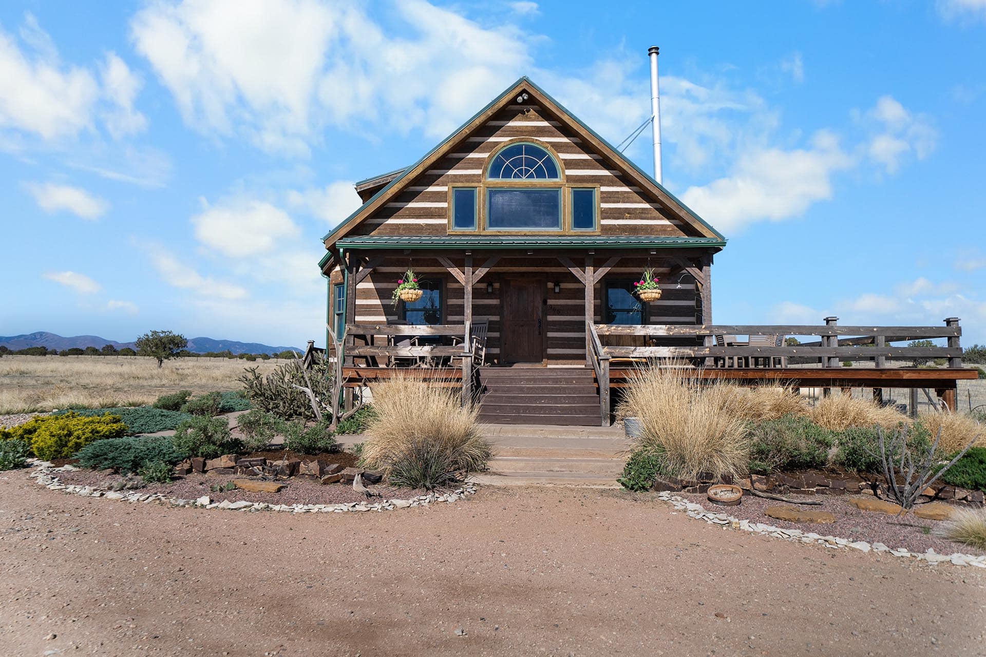 log home with front porch colorado mchenry ranch