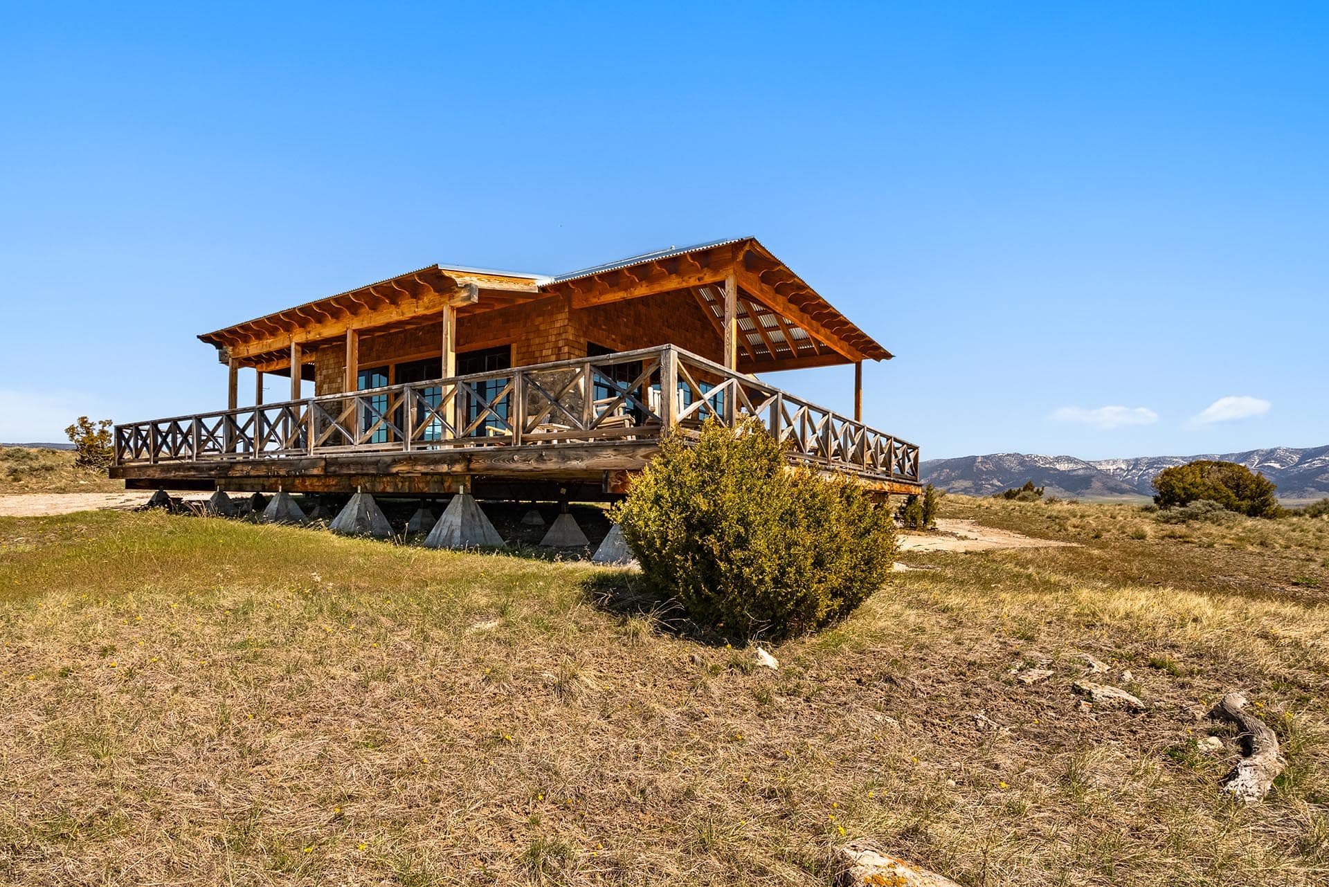 off grid cabin deck and tree montana dry creek wilderness at sxs ranch