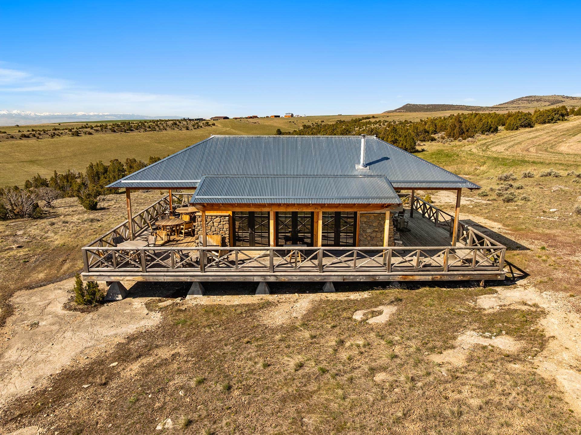 off grid cabin porch montana dry creek wilderness at sxs ranch