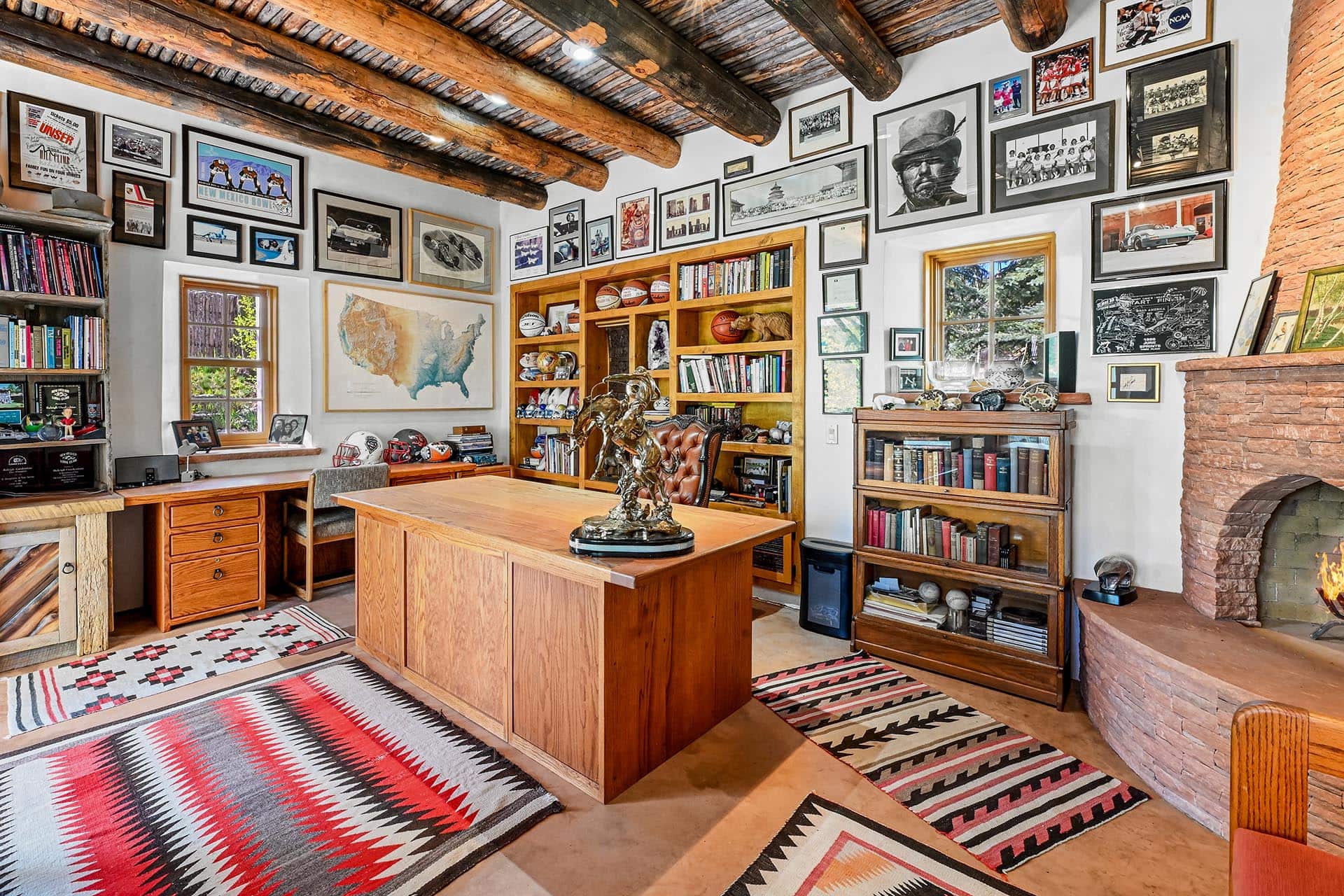 office with brick fireplace and vigas ceiling residential estate new mexico old canones creek ranch