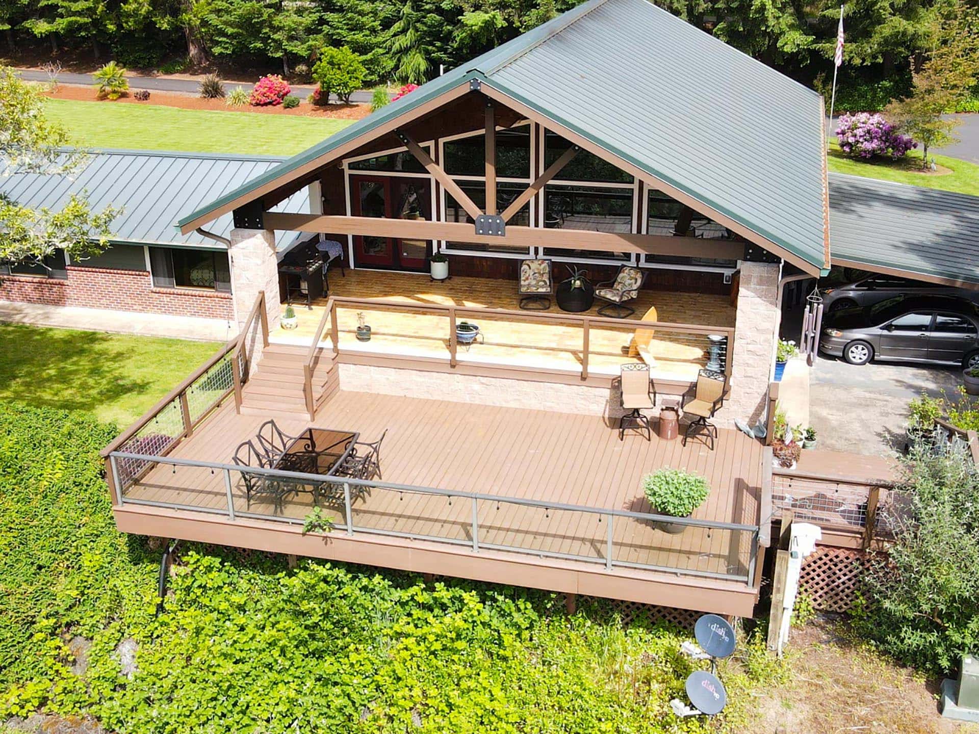 outdoor living deck overlooking river oregon umpqua river retreat at cougar creek