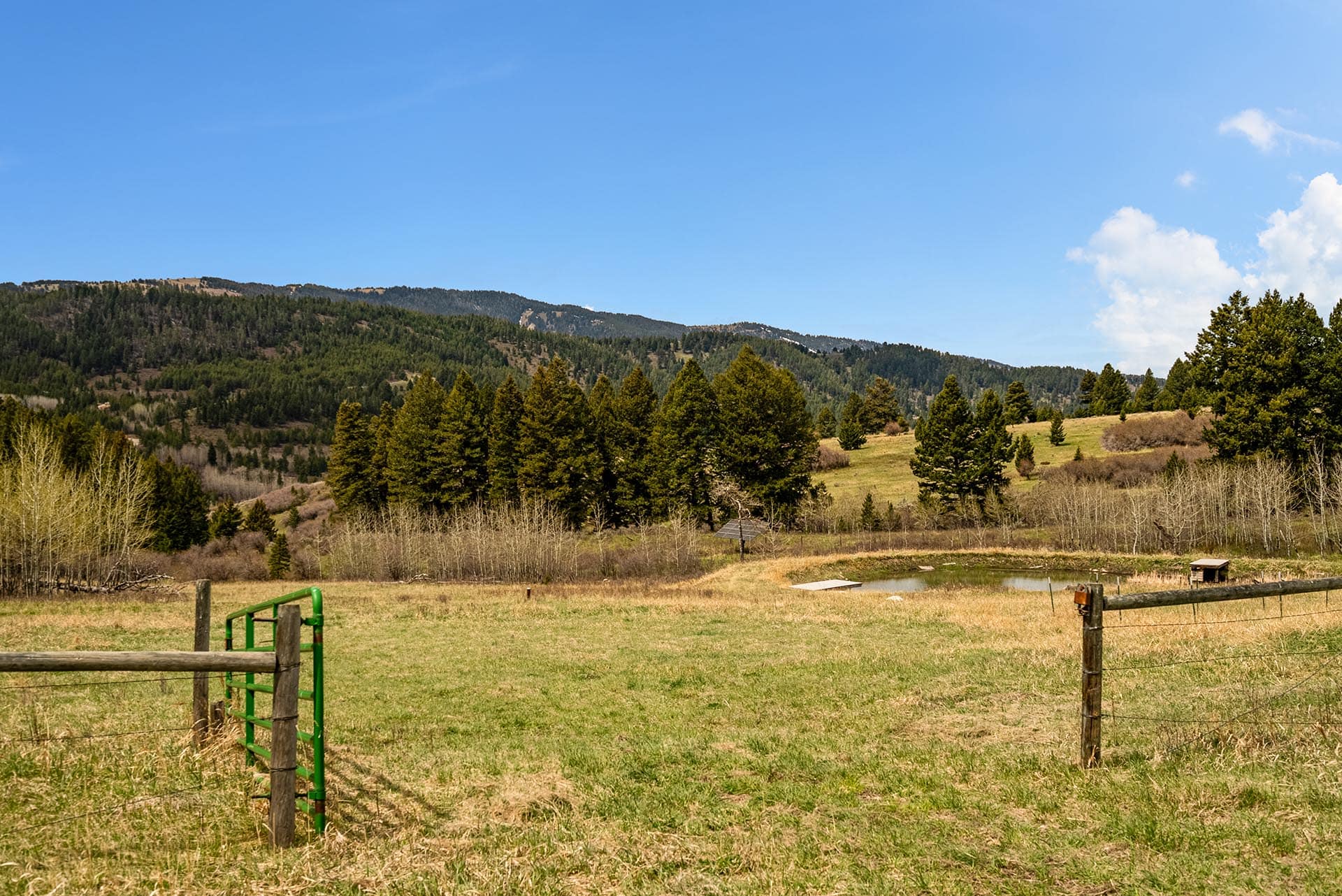 pasture with pond and mountain views land montana harrison hollow