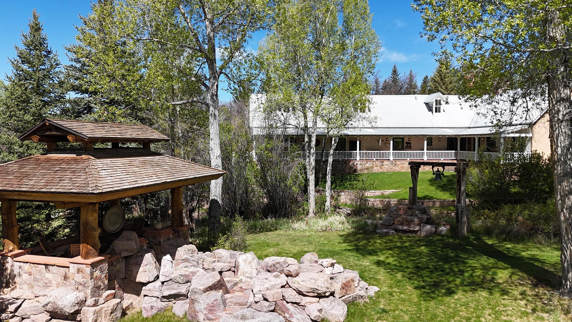 residential estate for sale with outdoor stone well house new mexico old canones creek ranch