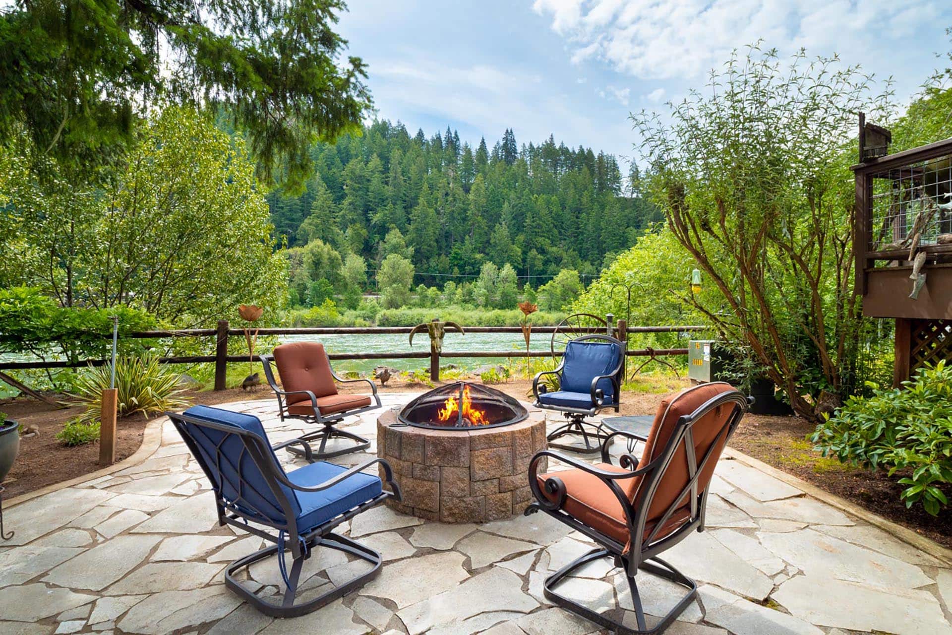 riverfront fire pit outdoor seating area oregon umpqua river retreat at cougar creek