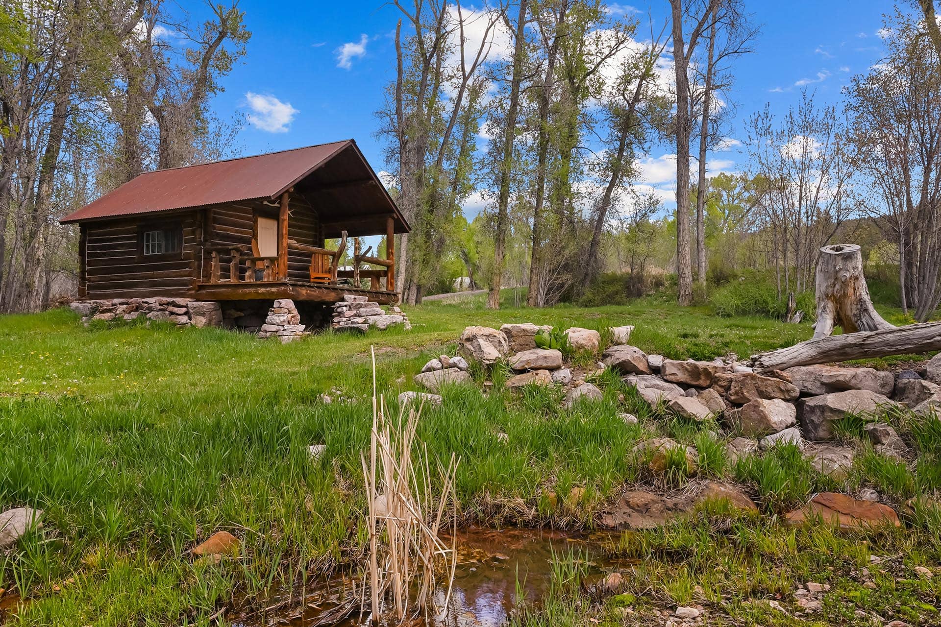 rustic log cabin by stream 44 75 acres for sale new mexico old canones creek ranch