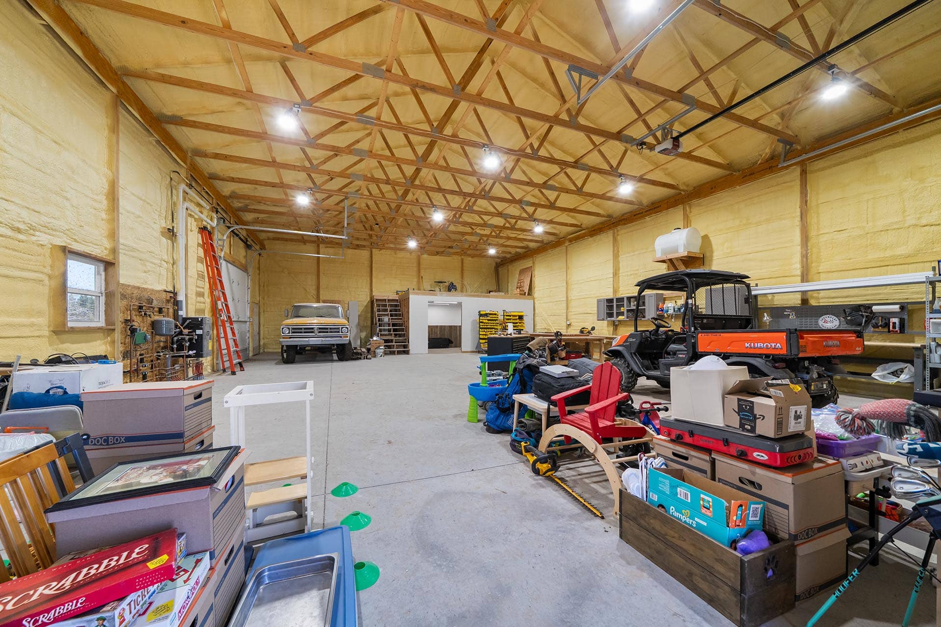 shop building interior with vehicles colorado mchenry ranch