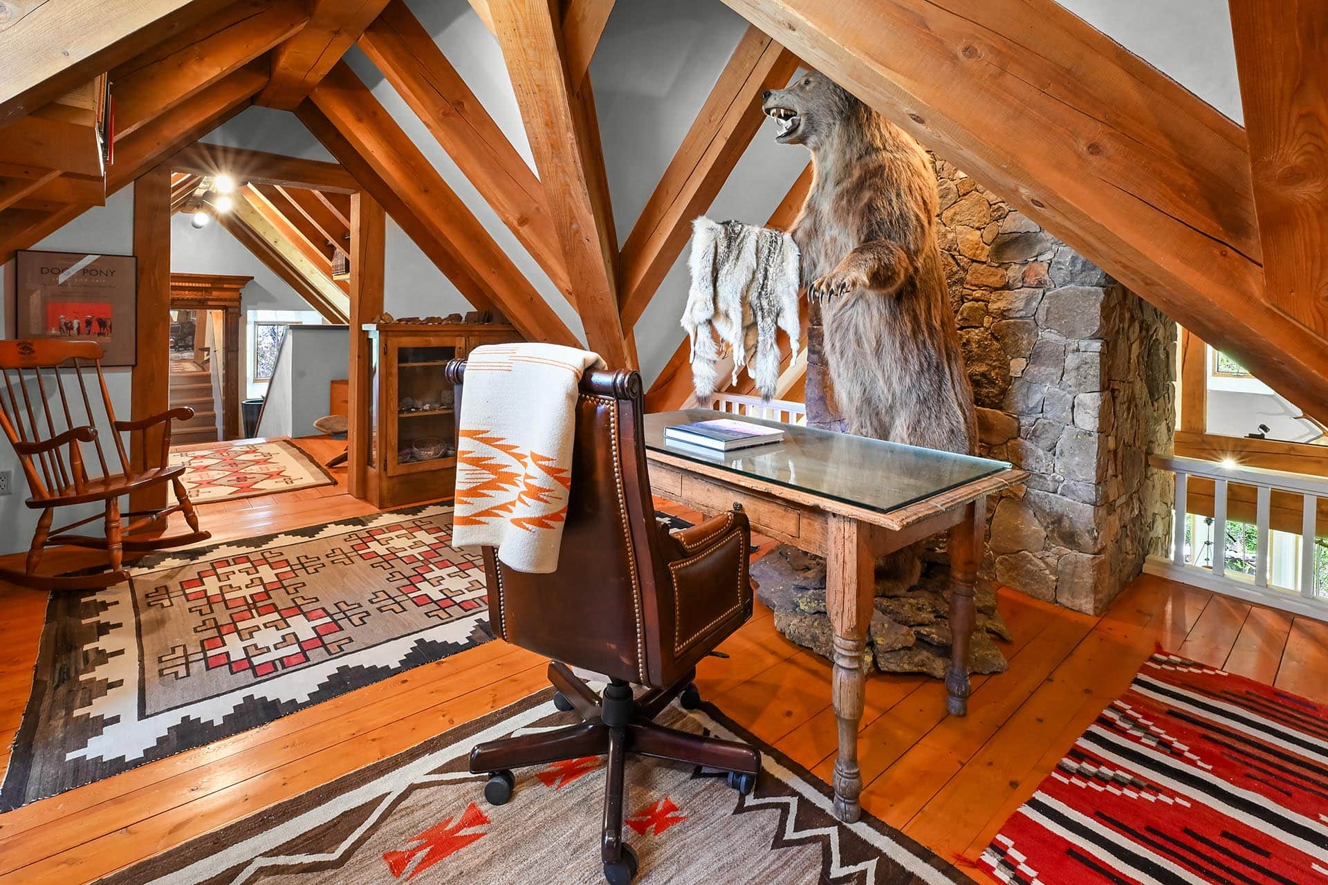 unique attic office with stone wall and taxidermy new mexico old canones creek ranch