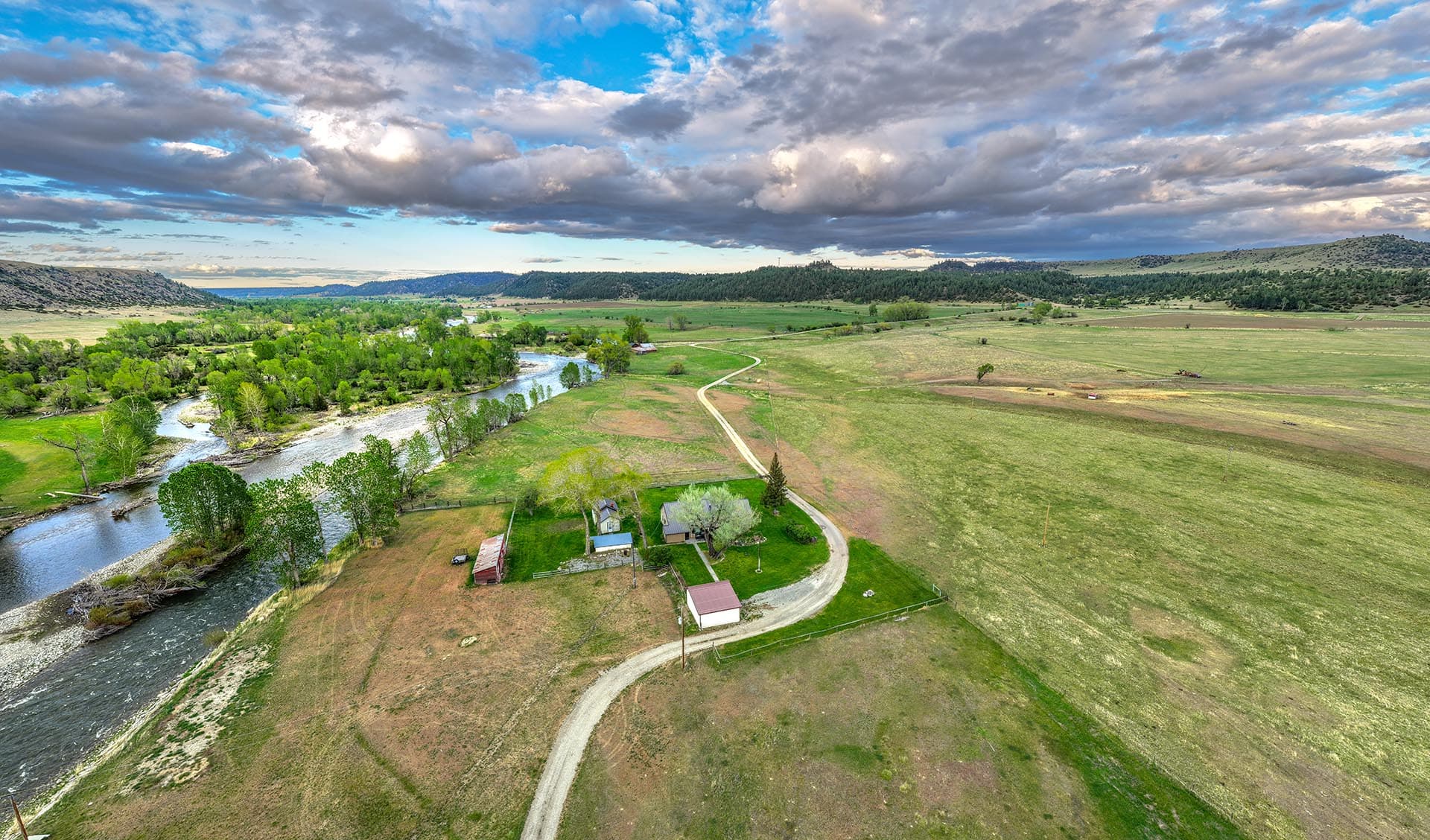 aerial view of main house with river frontage land montana stillwater riffle ranch